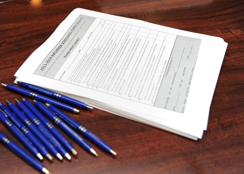 Influenza Vaccination forms lay on a desk at the General Dougherty Conference Center on Barksdale Air Force Base, La. Oct. 18, 2013. The 2nd MDG requires all individuals receiving the vaccination to fill out an influenza screening form to determine if they are able to be vaccinated or if they should receive a shot or mist. (U.S. Air Force photo/Senior Airman Joseph A. Pagán Jr.)