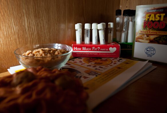 Examples of healthy food choices are displayed in the Health and Wellness Center during the Better Body Better Life class at Ellsworth Air Force Base, S.D., Oct. 10, 2013. The HAWC offers a vierty of training programs to help Airmen not only improve their health, but maintain a high level of expeditionary combat readiness. (U.S. Air Force photo by Airman 1st Class Alystria Maurer/Released)