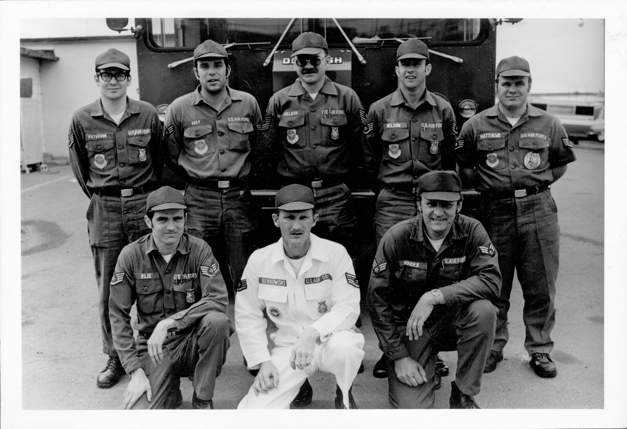 In 1974, the 133rd fire department received its first new truck, an Air Force P-4.  Here, firefighters take a photo with their vehicle training instructor from Chanute AFB.  The P-4 was used at the 133rd until replaced in 2008.  Courtesy of the Minnesota Air National Guard.