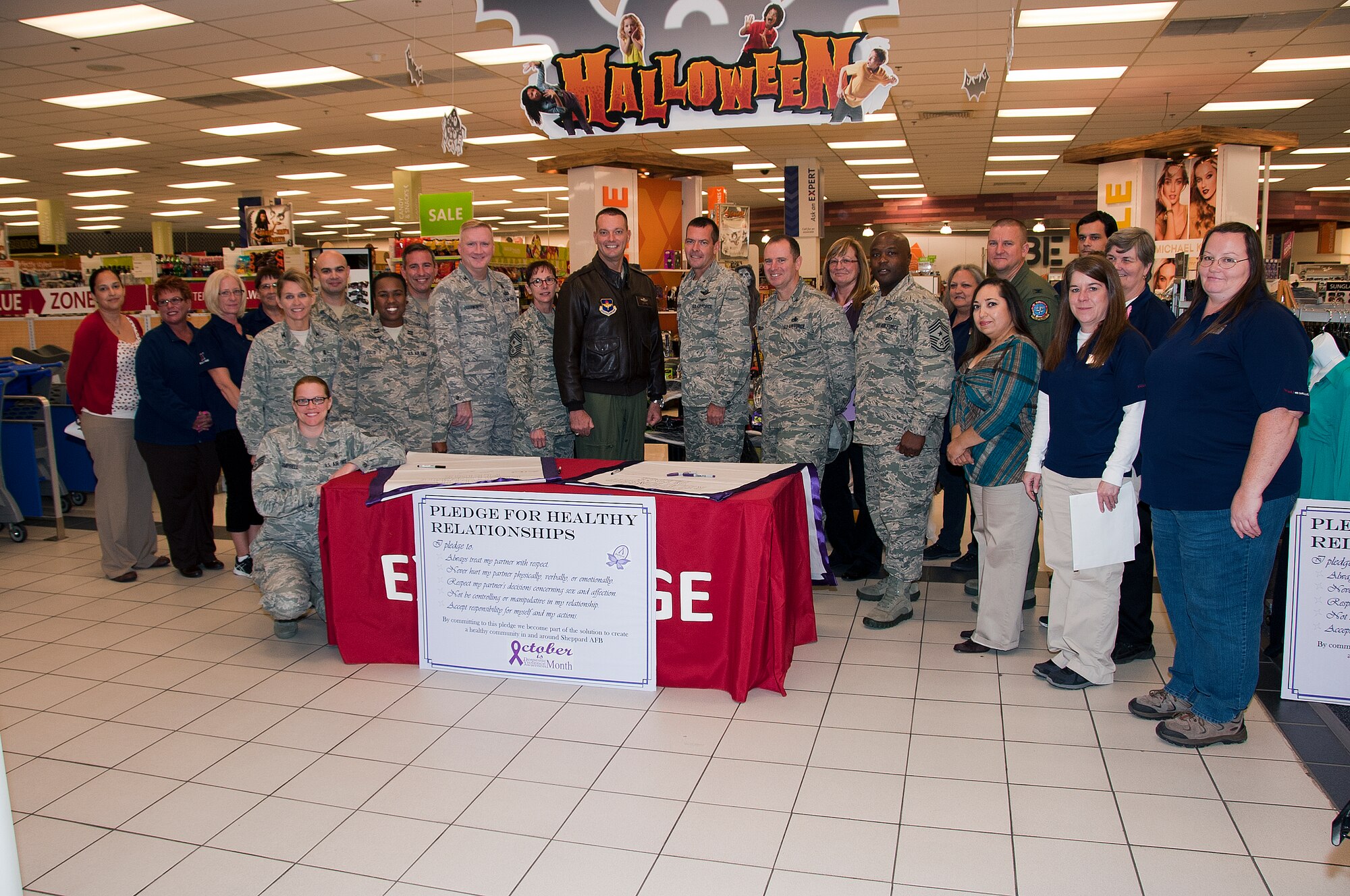 82nd Training Wing and 80th Flying Training Wing leadership supported Domestic Violence Awareness Month by signing a pledge in the Base Exchange Oct. 16. According to the National Coalition Against Domestic Violence, in October 1987, the first Domestic Violence Awareness Month was observed and the first national toll-free hotline was established. (U.S. Air Force photo by Frank Carter) 