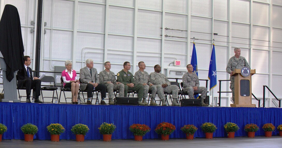 Maj. Gen. Thad Martin, adjutant general and commander of the Connecticut National Guard, addresses Airmen of the 103rd Airlift Wing, family and distinguished visitors during a formal roll-out ceremony celebrating the arrival of the unit's newly-assigned airframe at Bradley Air National Guard Base, East Granby, Conn., Oct. 5, 2013. The first of eight C-130H aircraft expected to be assigned to the Connecticut Air National Guard touched down at Bradley September 24.  (U.S. Air National Guard photo courtesy of 103rd Airlift Wing Public Affairs)