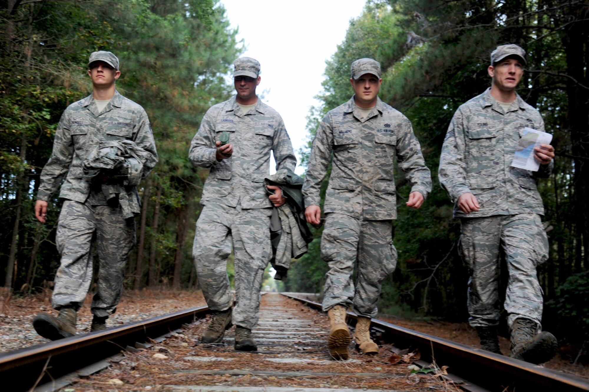 U.S. Air Force Airmen from the 633rd Civil Engineer Squadron Prime Base Emergency Engineer Force (BEEF) search for their next marker during land-navigation training at Fort Eustis, Va., Oct. 16, 2013. Because Prime BEEF units partner with all branches of the military, land navigation is vital towards mission success in deployed locations. (U.S. Air Force photo by Airman 1st Class Austin Harvill/Released)