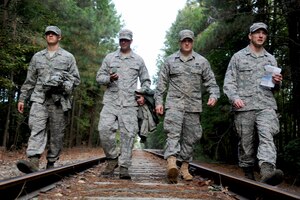 U.S. Air Force Airmen from the 633rd Civil Engineer Squadron Prime Base Emergency Engineer Force (BEEF) search for their next marker during land-navigation training at Fort Eustis, Va., Oct. 16, 2013. Because Prime BEEF units partner with all branches of the military, land navigation is vital towards mission success in deployed locations. (U.S. Air Force photo by Airman 1st Class Austin Harvill/Released)