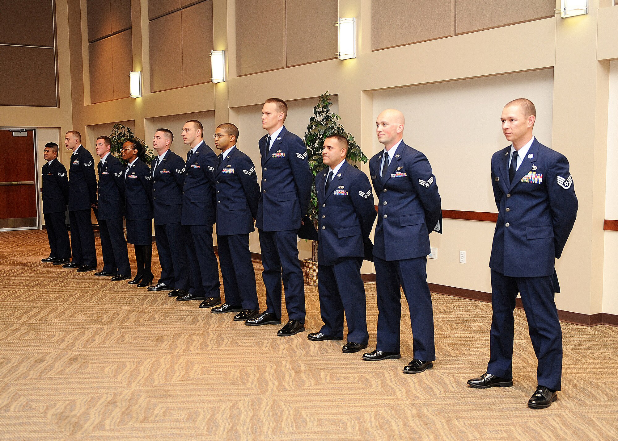 Buckley Airman Leadership School Class 13-G stands after receiving their diplomas Oct. 17, 2013, at the Leadership Development Center on Buckley Air Force Base, Colo. ALS is the first step in professional military education and is designed to develop Airmen into effective front-line supervisors. (U.S. Air Force photo by Senior Airman Marcy Copeland/Released)