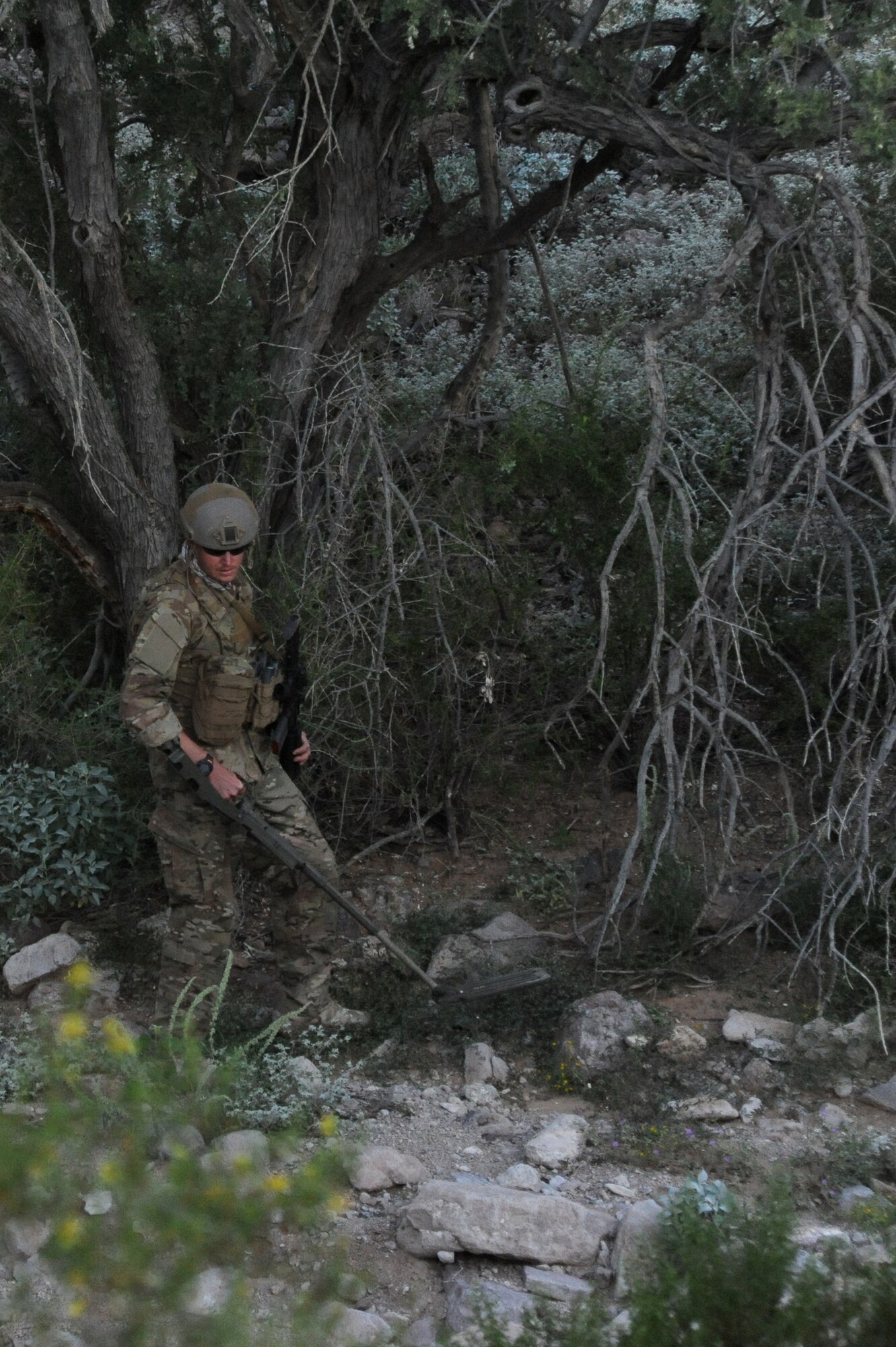 Staff Sgt. Steven Dauck, 56th Civil Engineer Squadron Explosive Ordnance Disposal team leader, participates in predeployment training Sept. 17 through 20 at the Barry M. Goldwater Range in Southwest Arizona. Along the paths were trip wires to ensure the EOD teams practiced situational awareness. (U.S. Air Force photo/Airman 1st Class Pedro Mota)