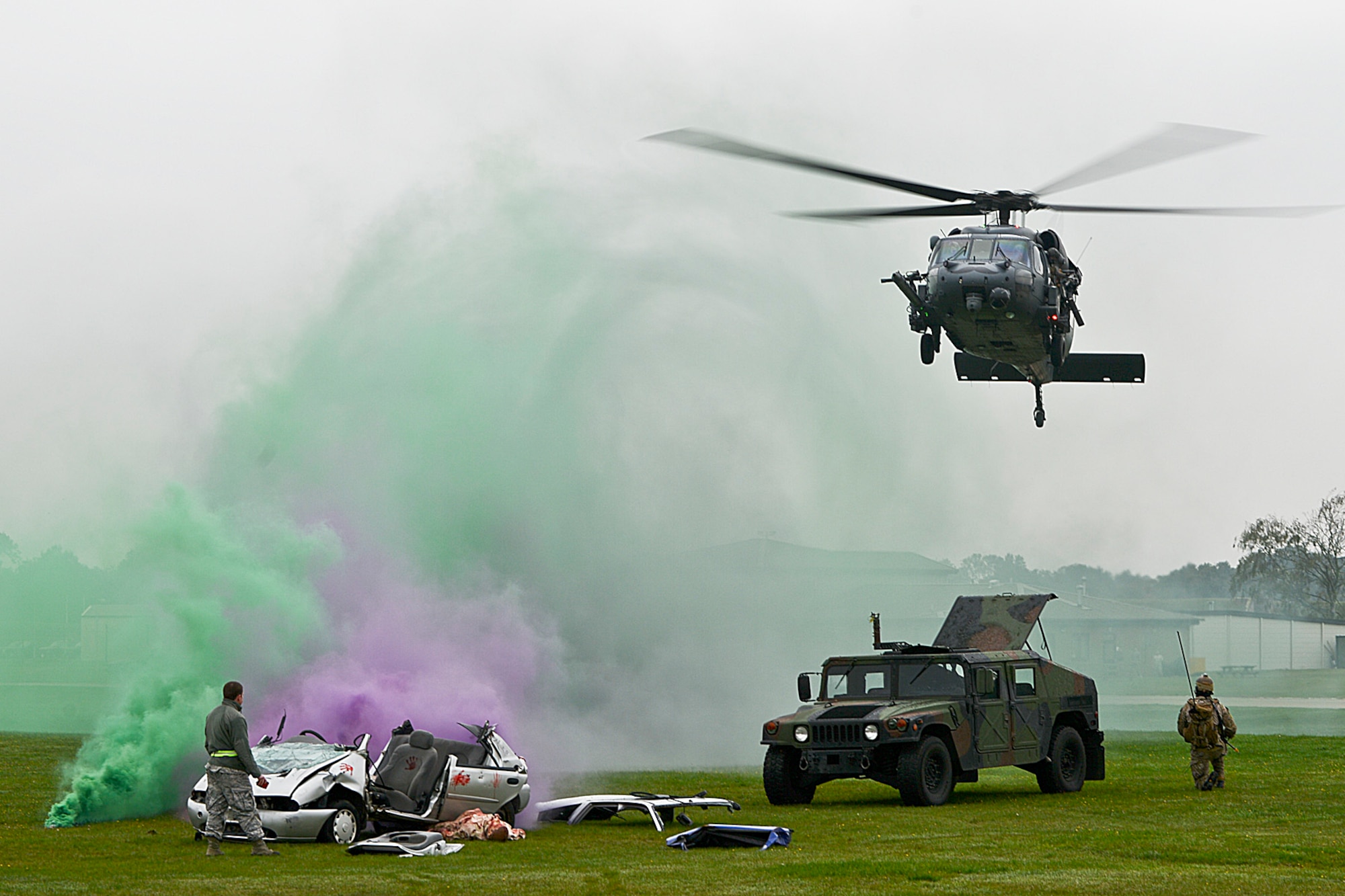 A 56th Rescue Squadron HH-60G Pave Hawk swoops in during a combat rescue training exercise at Royal Air Force Lakenheath, England, Oct. 17, 2013. The scenario was a rescue mission in which the pararescue team recovered an injured person involved in a vehicle borne improvised explosive device blast. (U.S. Air Force photo by Airman 1st Class Trevor T. McBride\Released)   