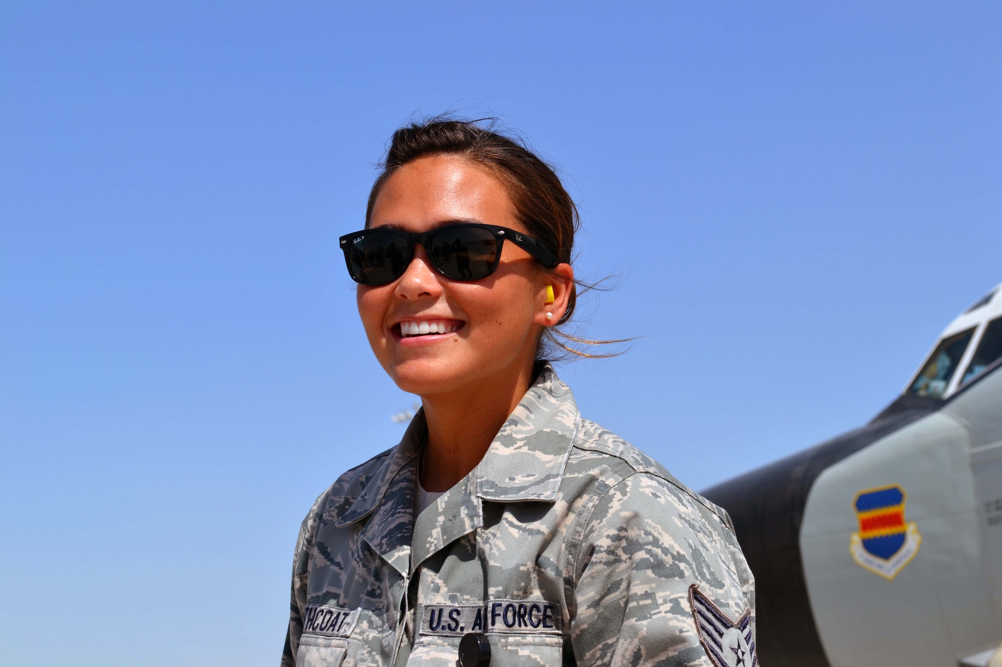 Staff Sgt. Kimberly Haithcoat waits for her father Senior Master Sgt. Thomas Lindell, to finish his final flight aboard an RC-135 Rivet Joint at the 379th Air Expeditionary Wing in Southwest Asia, Oct. 10, 2013. Haithcoat and her father were both deployed at the same time and able to spend the last four months of his service in the Air Force together. Haithcoat is an Air Forces Central Command knowledge operations manager deployed from Minot AFB, N.D., and a Bellevue, Neb., native. Lindell is a 763rd Expeditionary Reconnaissance Squadron RC-135 systems engineer deployed from Offutt Air Force Base, Neb., and a Milbank, S.D., native. (U.S. Air Force photo/Capt. Robert Butler)