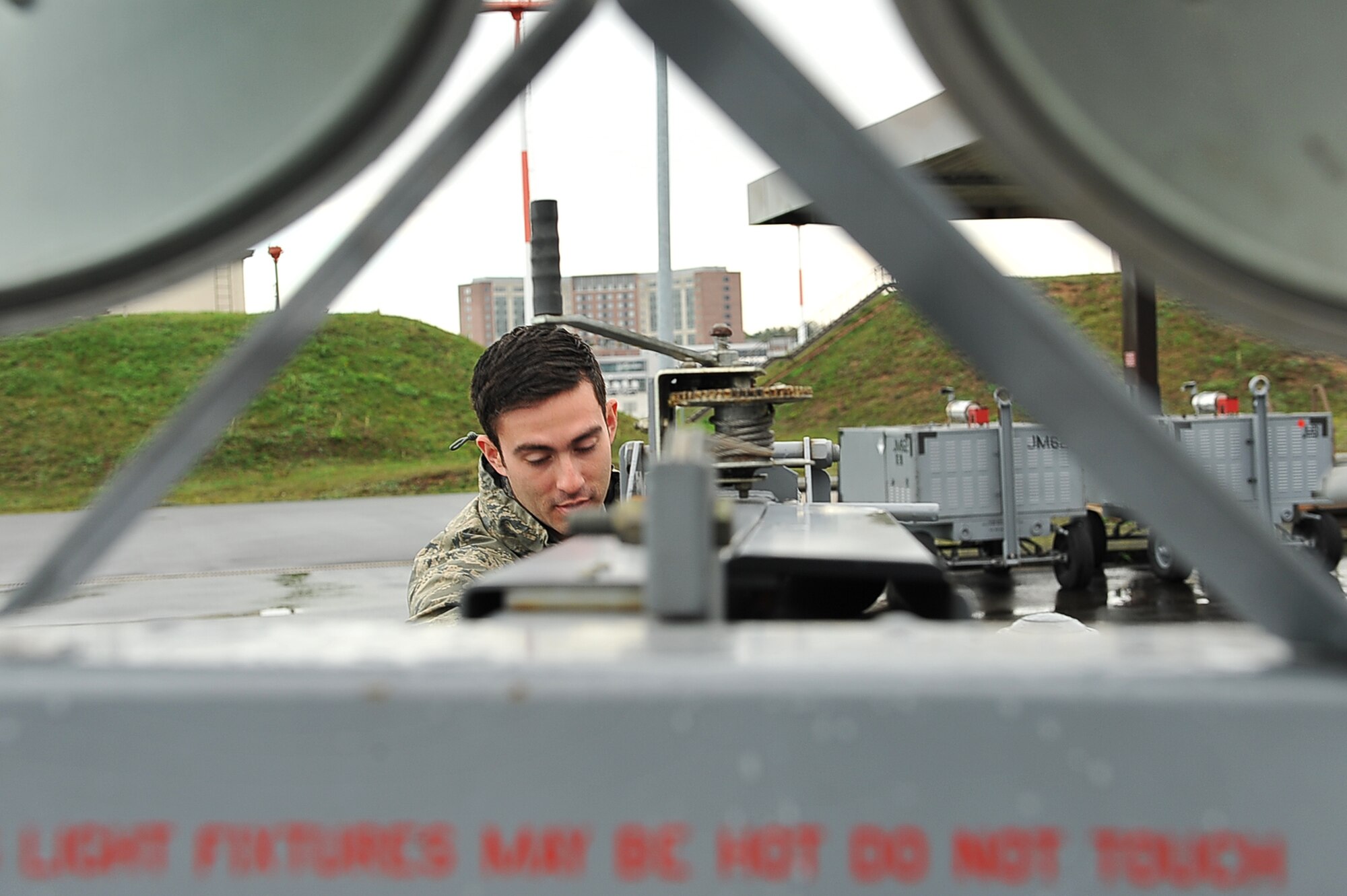 Airman 1st Class, Jonathan Penata, 86th Maintenance Squadron Aerospace Ground Equipment technician, returns a generator to its storage area, Oct. 10, 2013, Ramstein Air Base Germany. 86th AGE flight maintains all ground equipment for any aircraft coming through Ramstein. (U.S. Air Force photo/ Senior Airman Aaron-Forrest Wainwright)