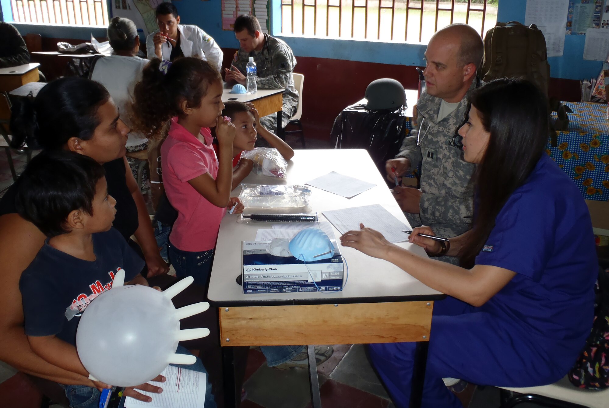 Members of Joint Task Force-Bravo's Medical Element (MEDEL) provide medical care to Honduran citizens during a Medical Readiness Training Exercise (MEDRETE) in the Department of Comayagua, Honduras, Oct. 17, 2013.  Joint Task Force-Bravo partnered with the Honduran Ministry of Health and the Honduran military to provide medical care to more than 900 people during the operation.  (Photo by U.S. Army Sgt. Courtney Kreft)