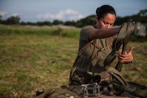 Staff Sgt. Crystal Salinas checks a pallet dropped from a KC-130J Hercules at a drop zone on Basa Air Base, Pampanga, Republic of the Philippines during mass supply load training Oct. 2 as part of Amphibious Landing Exercise 2014. During the training, Marines delivered supplies and equipment by parachute from a KC-130J Hercules aircraft, demonstrating expeditionary capabilities that could be used during humanitarian assistance and disaster relief missions. The recurrence of PHIBLEX, now in its 30th year, demonstrates the commitment of the U.S. and Republic of the Philippines to mutual security and their long-time partnership. Salinas is the paraloft chief and air delivery specialist with Combat Logistics Regiment 37, 3rd Marine Logistics Group, which is currently part of the logistics combat element for 3d Marine Expeditionary Brigade, III Marine Expeditionary Force. 