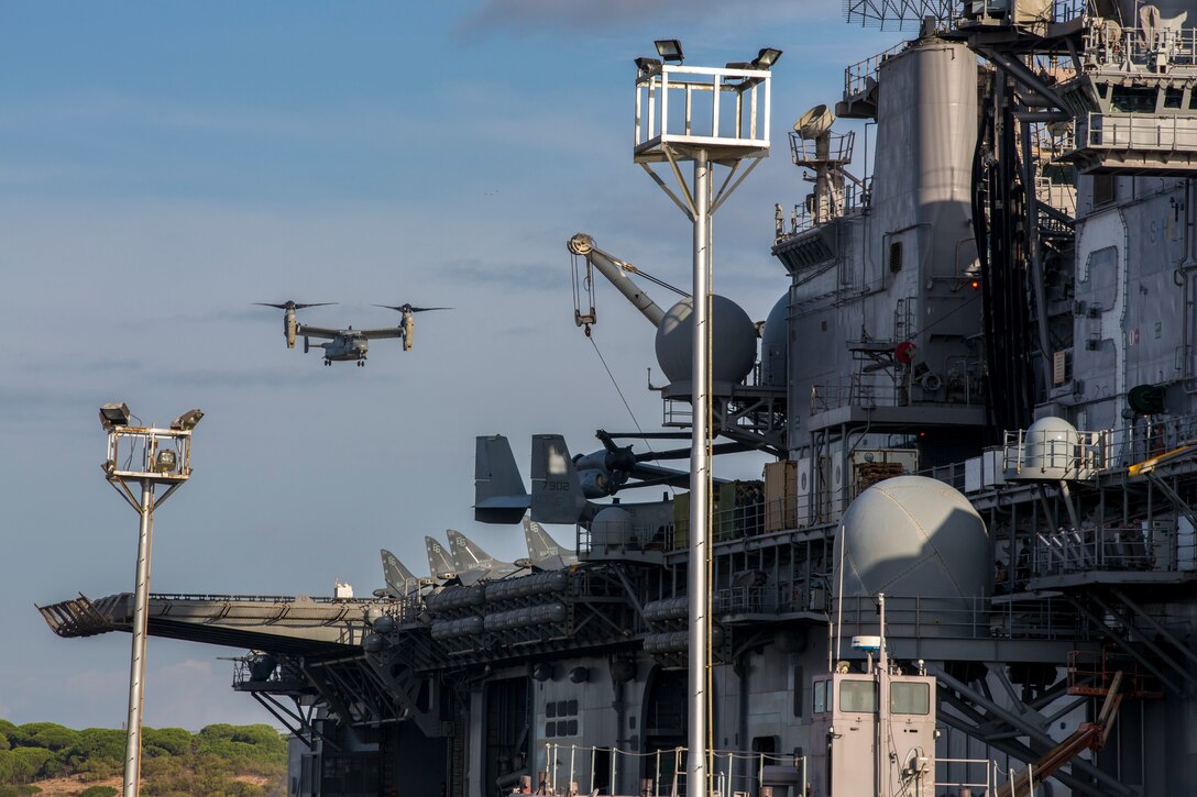 An MV-22B Osprey assigned to Marine Medium Tiltrotor Squadron (VMM) 266 (Reinforced),  26th Marine Expeditionary Unit (MEU), lands aboard the USS Kearsarge (LHD 3) during the 26th MEU’s wash down in Naval Station Rota, Spain, Oct. 19, 2013. The 26th MEU is a Marine Air-Ground Task Force forward-deployed to the U.S. 6th Fleet area of responsibility aboard the Kearsarge Amphibious Ready Group serving as a sea-based, expeditionary crisis response force capable of conducting amphibious operations across the full range of military operations.  (U.S. Marine Corps photo by Sgt. Christopher Q. Stone, 26th MEU Combat Camera/Released) 