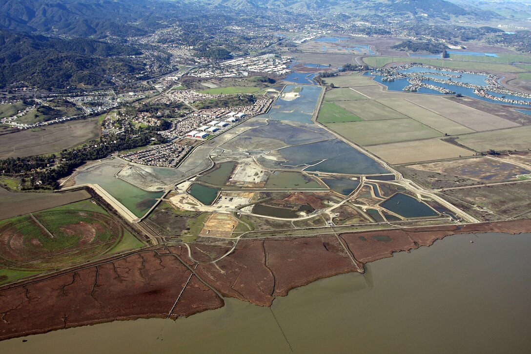 The U.S. Army Corps of Engineers San Francisco District, along with the California State Coastal Conservancy, its non-federal sponsor, is constructing a 988-acre wetland restoration project in Novato, Calif., at what was once the former Hamilton Army Airfield. The project allows for the beneficial use of 24.4 million cubic yards of dredged material, including 3.5 million cubic yards from the Port of Oakland 50' Deepening Project.