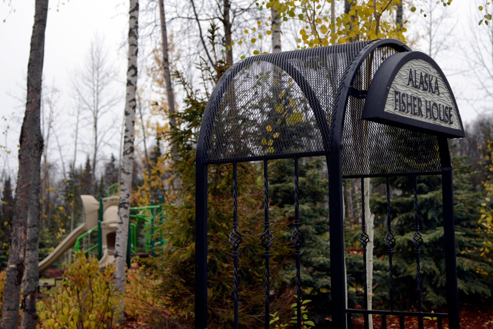 After six months of preparation, the newly-built playground can be seen behind the Fisher House of Alaska, Joint Base Elmendorf-Richardson, Oct. 10. The Fisher House provides temporary lodging for service members, veterans and their families while receiving medical care at the Joint Venture Department of Defense and Veterans Affairs Hospital on JBER. (U.S. Air Force photo/Staff Sgt. Sheila deVera)