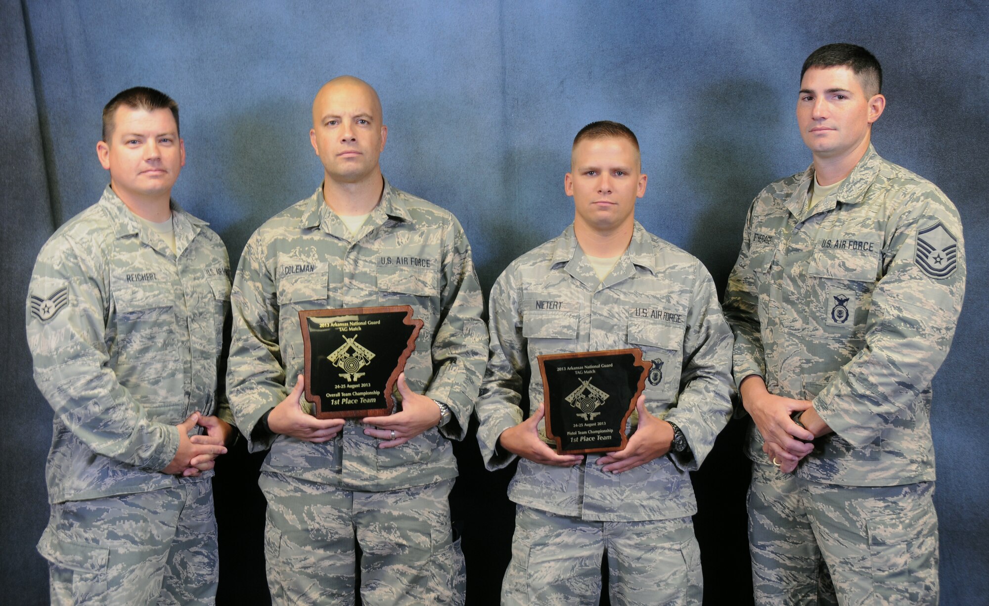 From left: Team members Staff Sgt. Jason Reichert, Tech. Sgt. Phillip Coleman, Staff Sgt. Derek Nietert and Master Sgt. Brian Detherage. The quartet comprise the 1st Place Overall team and 1st Place Pistol team at the 2013 Arkansas Adjutant General's Marksmanship Exercise held at the National Guard Marksmanship Training Center at Camp Joseph T. Robinson, Ark. The 188th Airmen competed against National Guardsmen from across the state of Arkansas in a variety of combat shooting events.  (U.S. Air National Guard photo by Senior Airman John Hillier/188th Fighter Wing Public Affairs)