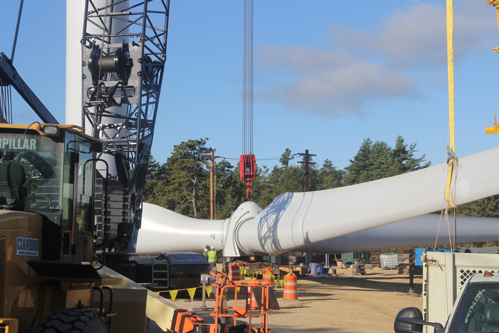 CAPE COD AIR FORCE STATION, Mass. – The turbine’s 120-foot long blades are assembled before being hoisted into place. The two turbines can together produce up to 3.2 megawatts of power putting the 21st Space Wing in line with the Air Force's goal of using 25 percent renewable energy by 2025. (U.S. Air Force photo)