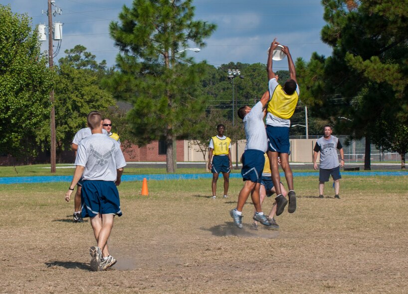 U.S. Air Force Airmen play ultimate frisbee during Super Sports Day at Moody Air Force Base, Ga., Oct. 18, 2013. Super Sports Day was an all day event, which let Airmen have some fun while doing physical activities. (U.S. Air Force photo by Airman 1st Class Alexis Grotz/Released)
