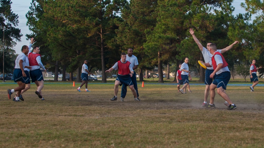 U.S. Air Force Airmen from the 23d Logistics Readiness Squadron and the 38th Rescue Squadron play ultimate frisbee during Super Sports Day at Moody Air Force Base, Ga., Oct. 18, 2013. Ultimate frisbee was one of 28 events held for that day. (U.S. Air Force photo by Airman 1st Class Alexis Grotz/Released)