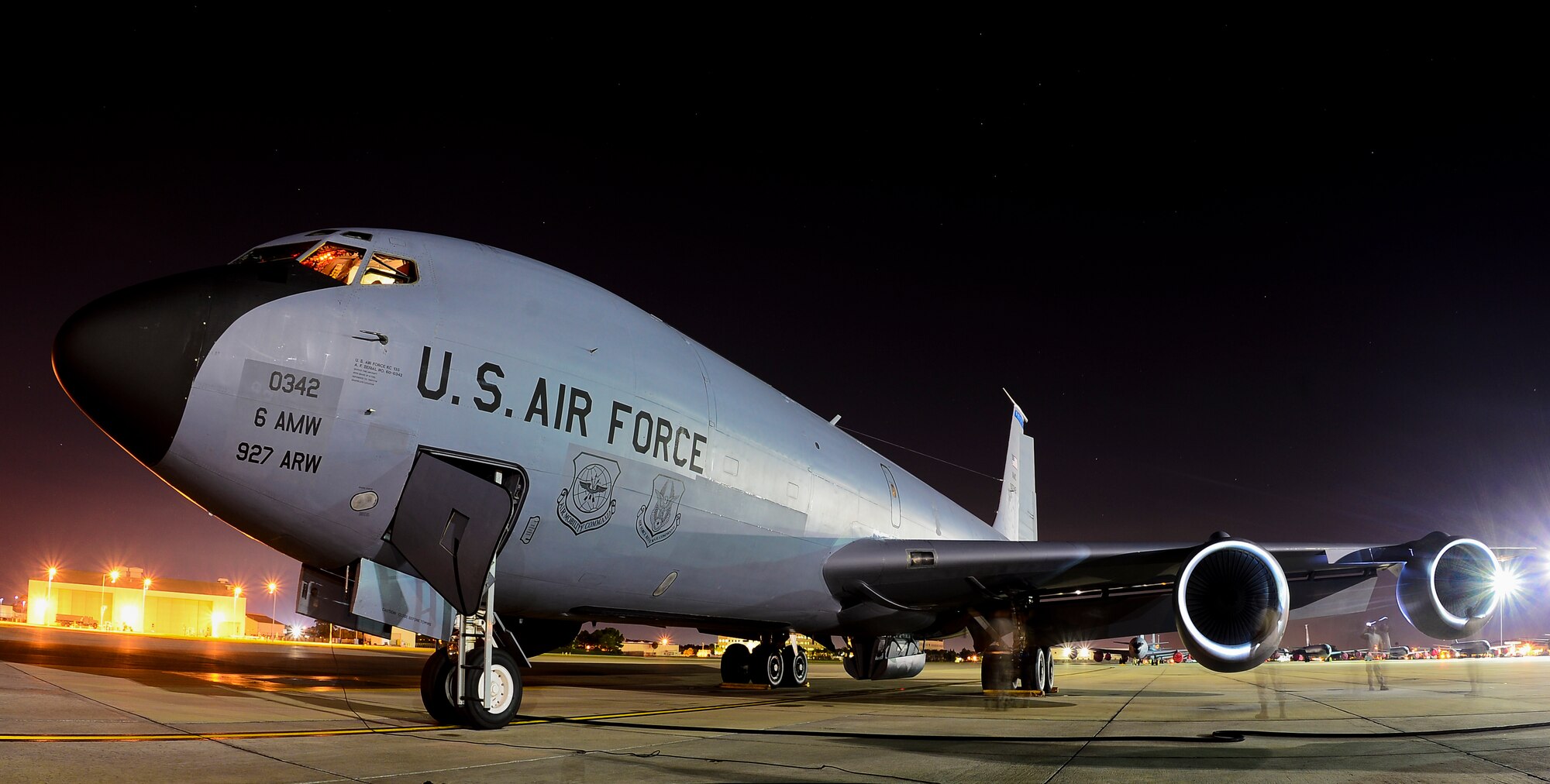 The 6th Aircraft Maintenance Squadron crewchiefs conduct a post flight inspection on a KC-135 Stratotanker Oct. 10, 2013 at MacDill Air Force Base, Fla. The landing gears, electronics systems and the structure of airframe  are checked during each post flight inspection. (U.S. Air Force photo by Staff Sgt. Brandon Shapiro/Released)