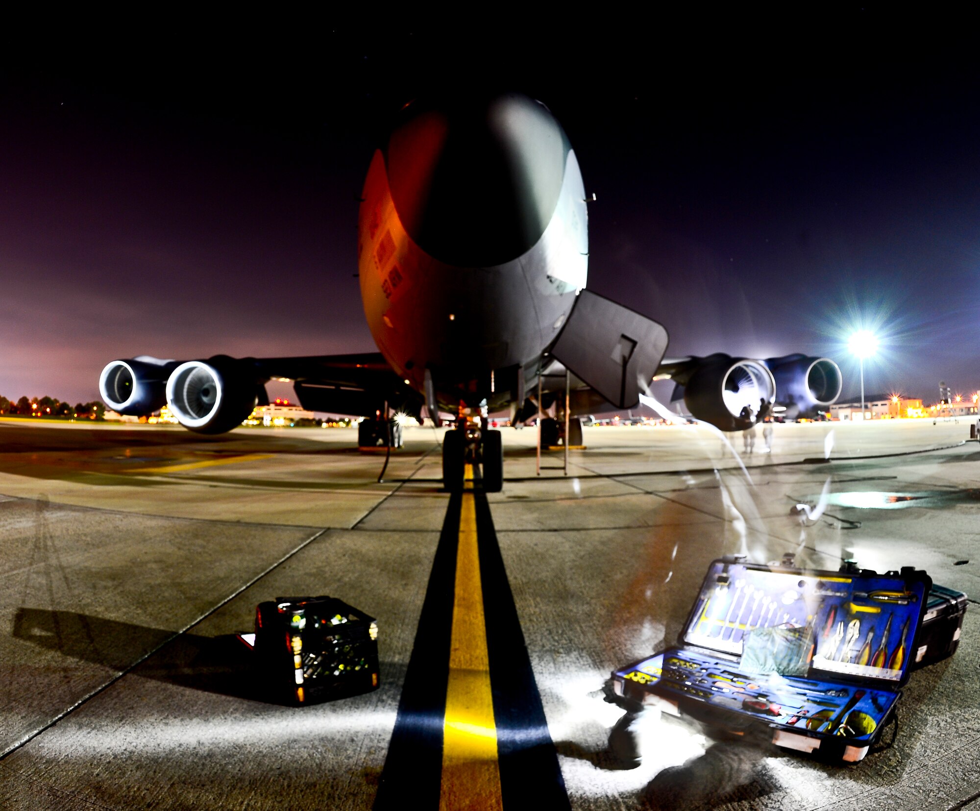 The 6th Aircraft Maintenance Squadron crewchiefs conduct a post flight inspection on a KC-135 Stratotanker Oct. 10, 2013 at MacDill Air Force Base, Fla. The landing gears, electronics systems and the structure of airframe  are checked during each post flight inspection. (U.S. Air Force photo by Staff Sgt. Brandon Shapiro/Released)