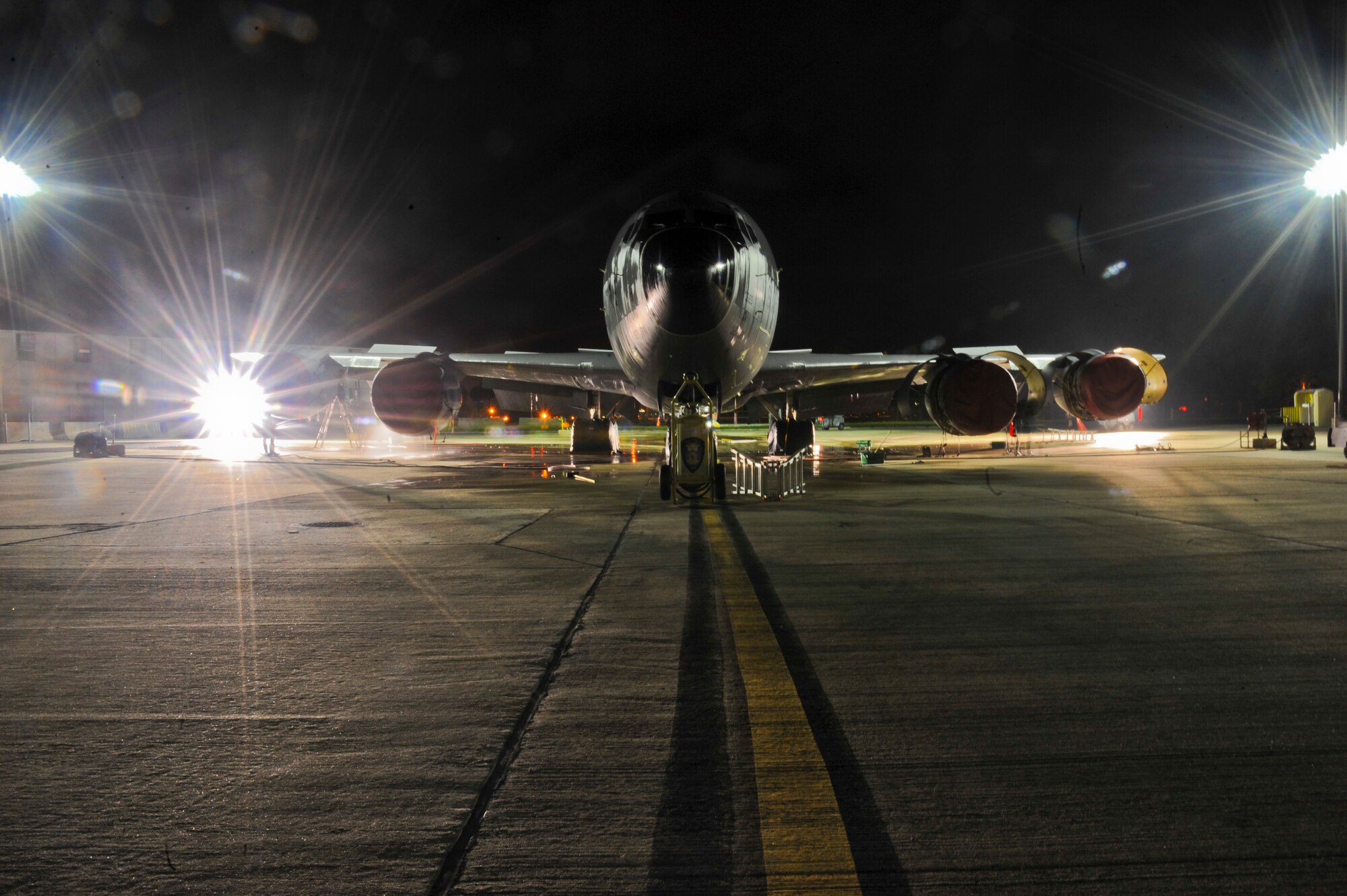 A KC-135 Stratotanker is washed during its monthly wash and lube at MacDill Air Force Base, Fla., Oct. 16, 2013. The massive, 136-foot jet took more than four hours to wash by hand. (U.S. Air Force photo by Airman 1st Class Ned T. Johnston/Released)