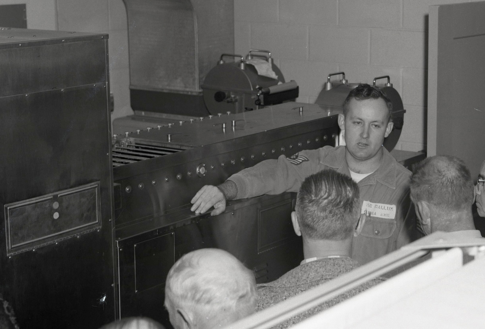 Technical Sgt. Duane McCallum shows the large film processing station to a group during a tour at the Iowa Air National Guard Base in Sioux City, Iowa in 1959. The mission of the 174th Tactical Reconnaissance Squadron at that time was to provide aerial photography.
Iowa Air Guard Photo