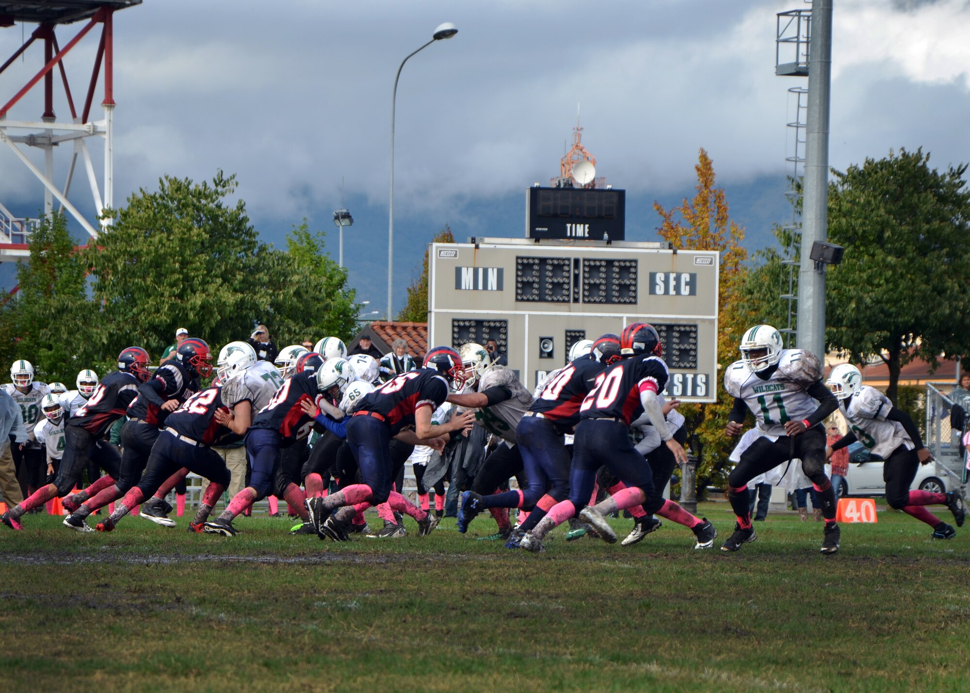 The Aviano Saints football team plays Naples in a homecoming game, Oct. 12, 2013, at Aviano Air Base, Italy. Aviano Saints won the game, 24-18, in double overtime. (U.S. Air Force photo/Ally Dinges)