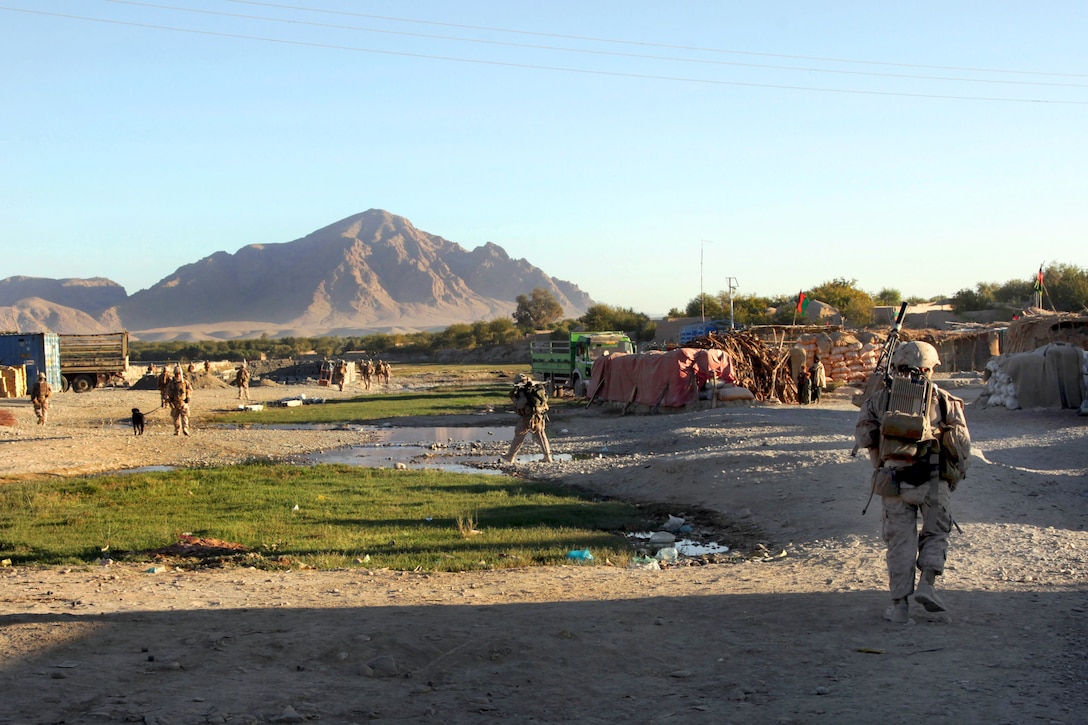 U.S. Marines patrol near Forward Operating Base Musa Qala in ...