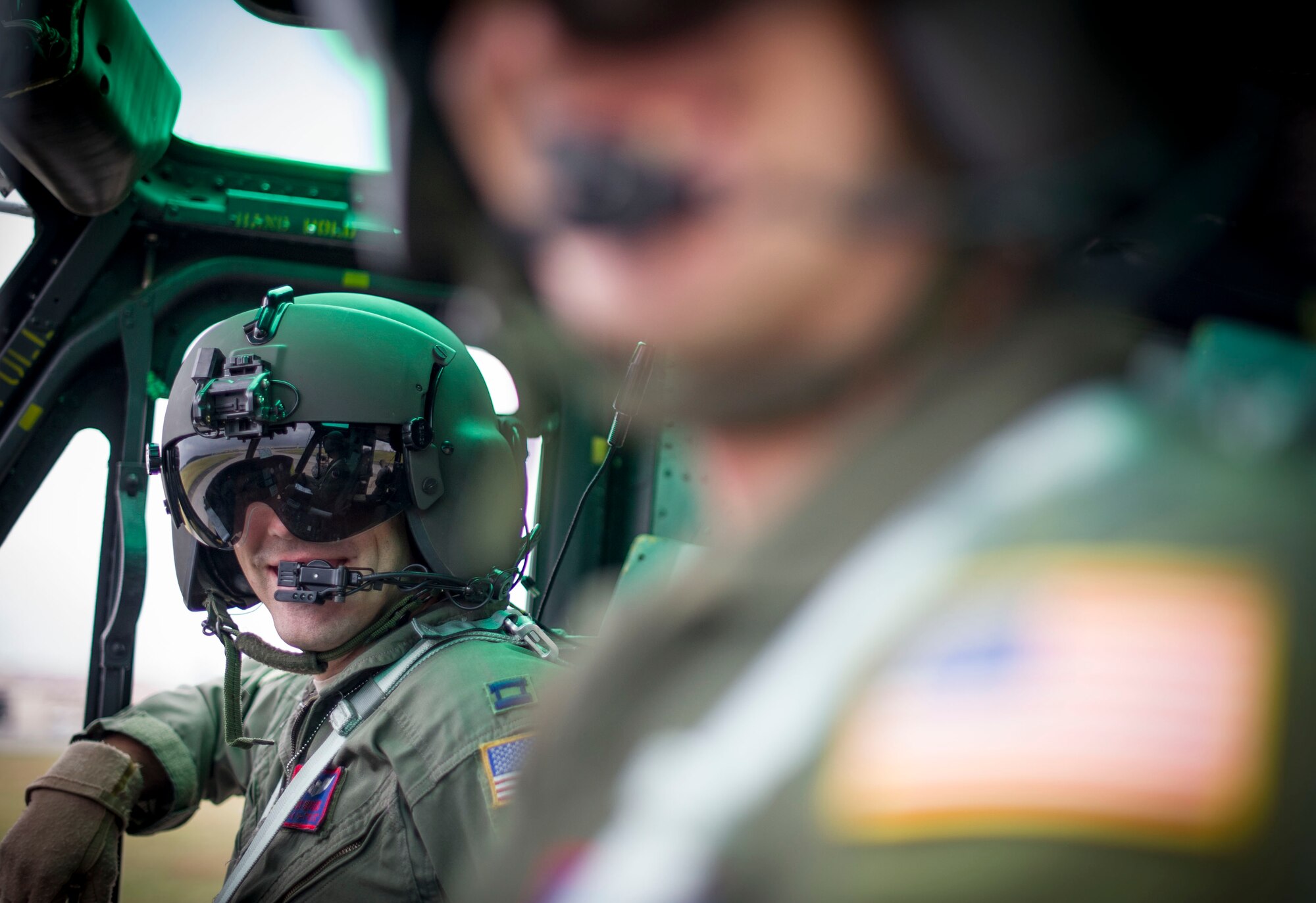 Capt. Ricky Hopkins, 459th Airlift Squadron UH-1 Huey helicopter pilot, waits for take off during a large formation mission Oct. 22, 2013, at Yokota Air Base, Japan. The wing conducts these large flight operations to test its capability to prepare and launch multiple aircraft at the same time, highlighting Yokota’s mission as the primary Western Pacific airlift hub for peacetime and contingency operations. (U.S. Air Force photo by Staff Sgt Stacy Moless/released)