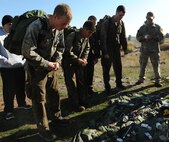 Candidates for Combat Rescue Officer selection are given 15 seconds to memorize as many objects as they can at Fairchild Air Force Base, Wash., Oct. 16, 2013. If selected as a CRO, they will organize and strategize recovery missions, train and equip rescue personnel, and manage and develop survival skills programs. (U.S. Air Force photo by Senior Airman Samantha Krolikowski/ Released)