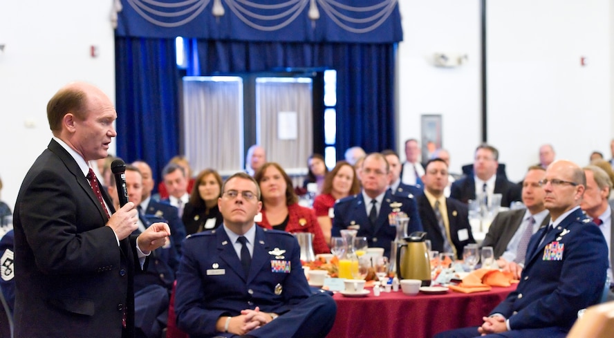 U.S. Sen. Chris Coons of Delaware speaks at the 2013 Military Construction breakfast and briefing Oct. 21, 2013, at The Landings on Dover Air Force Base, Del. Military leadership gave a briefing at the event that highlighted past, current and future construction projects on Dover AFB. (U.S. Air Force photo/Roland Balik)