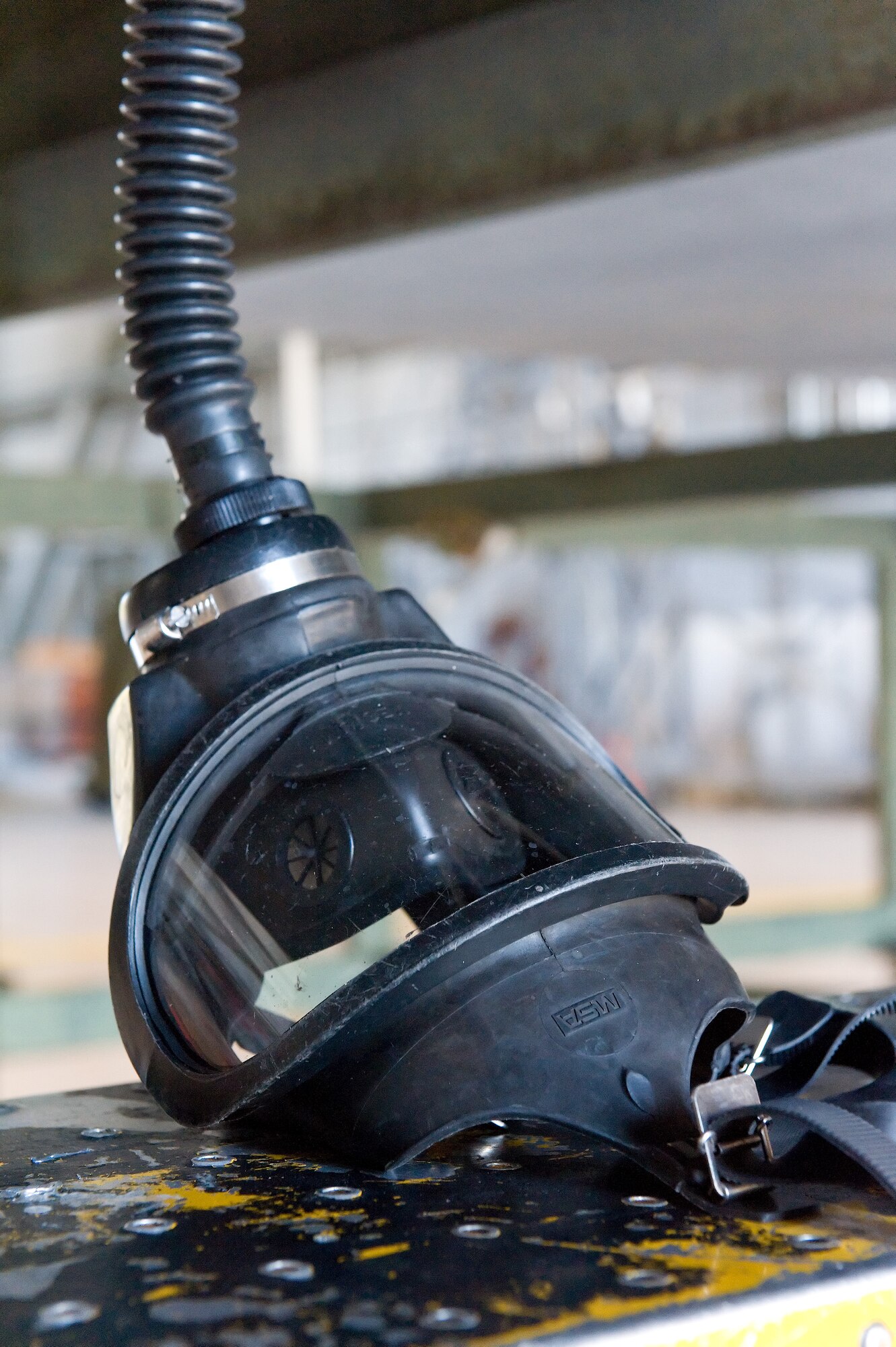 436th Maintenance Squadron?s Aircraft Fuel Systems Repair Facility personnel use this full-face inline air supplied respirator during a confined-space rescue exercise Oct. 18, 2013, at Dover Air Force Base, Del. Personnel entering an aircraft fuel tank must don a respirator prior to entering the tank.(U.S. Air Force photo/Roland Balik)
