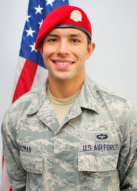 Airman 1st Class Michael Guzman earned the coveted scarlet beret of a combat controller Sept.12 at Fort Bragg, N.C., after 16 months of intense military training. (U.S. Air Force photo)