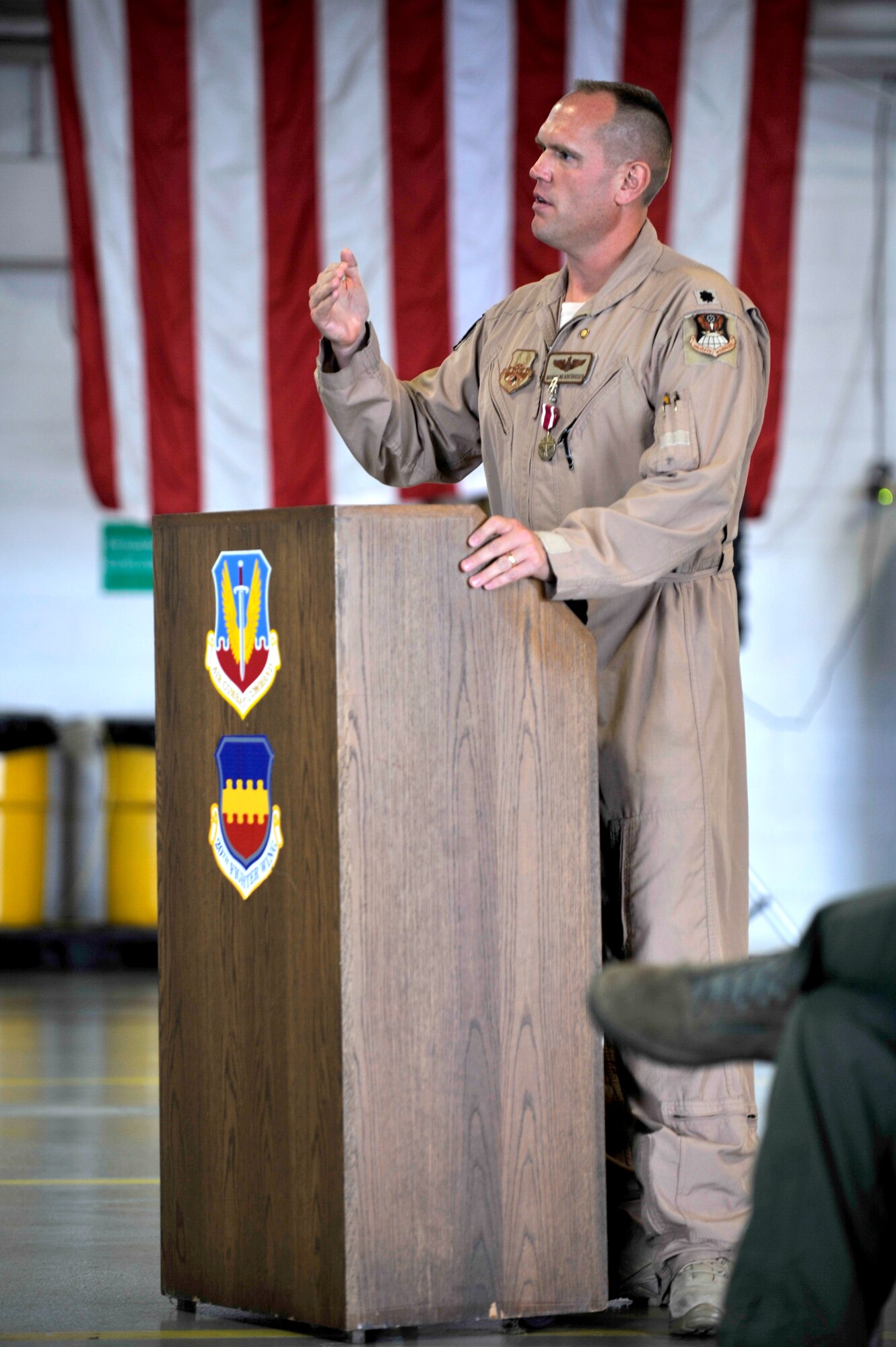 U.S. Air Force Lt. Col. Neaderhiser, 609th Air and Space Operations Center Chief of Contingency Operations, speaks about his career during his retirement ceremony Shaw Air Force Base S.C., Oct 18, 2013.  Neaderhiser gathered with family, friends and fellow Airmen to celebrate his 21-year career in the Air Force.  (U.S. Air Force photo by Airman 1st Class Jensen Stidham/Released)