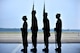 U.S. Air Force Honor Guard members stand at attention during Lt. Col. Neil Neaderhiser’s, 609th Air and Space Operations Center Chief of Contingency Operations, retirement ceremony Oct. 18, 2013, at Shaw Air Force Base, S.C. Neaderhiser gathered with family, friends and co-workers to celebrate his 21-year career in the Air Force. (U.S. Air Force photo by Airman 1st Class Jensen Stidham/Released)