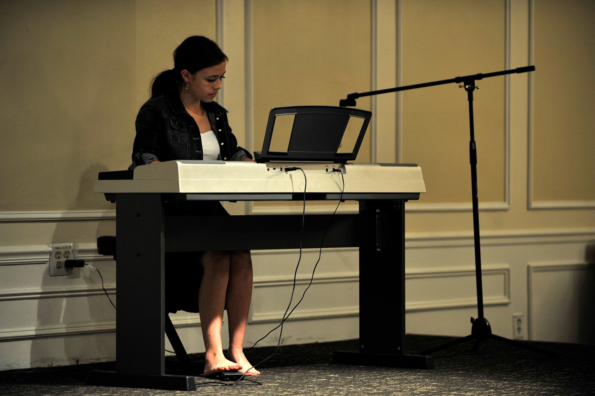 Emily Kelsey plays the piano during a “U Got Talent” competition, Oct. 17, 2013, Shaw Air Force Base, S.C. The base-level competition was held for performers to showcase their talent and compete to perform in the Air Force-level competition which will begin in December.  (U.S. Air Force photo by Airman 1st Class Jensen Stidham/Released)