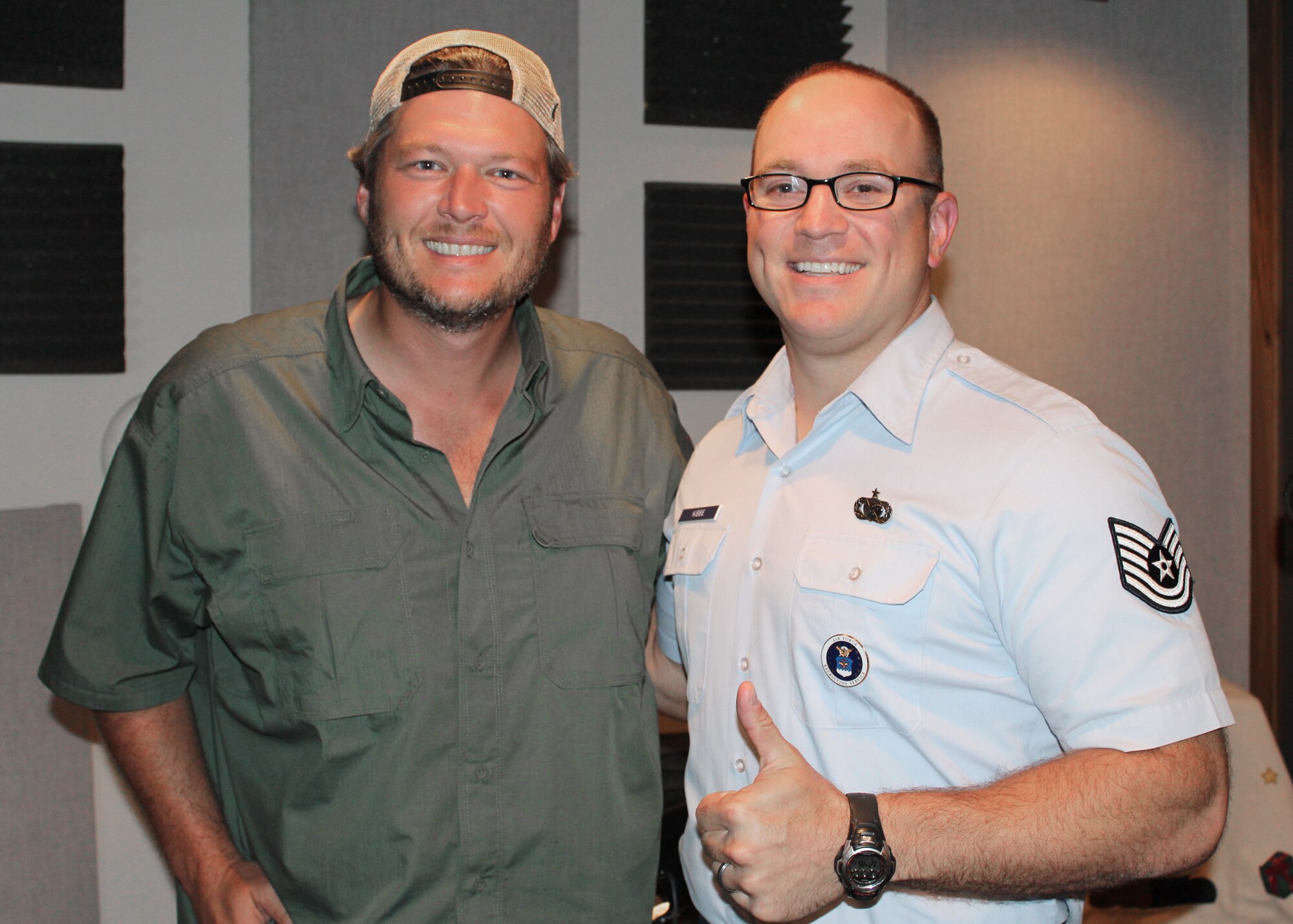 Tech. Sgt. Harry Kibbe gives a thumbs up after interviewing country supertar Blake Shelton for the 2013 "Red, White and Air Force Blue Christmas" radio special. The one-hour program, recorded at Spotland Productions in Nashville, will be sent to more than 2,000 country radio stations in the United States and the Armed Forces Network for airing during the upcoming holiday season. Air Force Recruiting Service produces the annual holiday special. (U.S. Air Force photo/Dale Eckroth)
