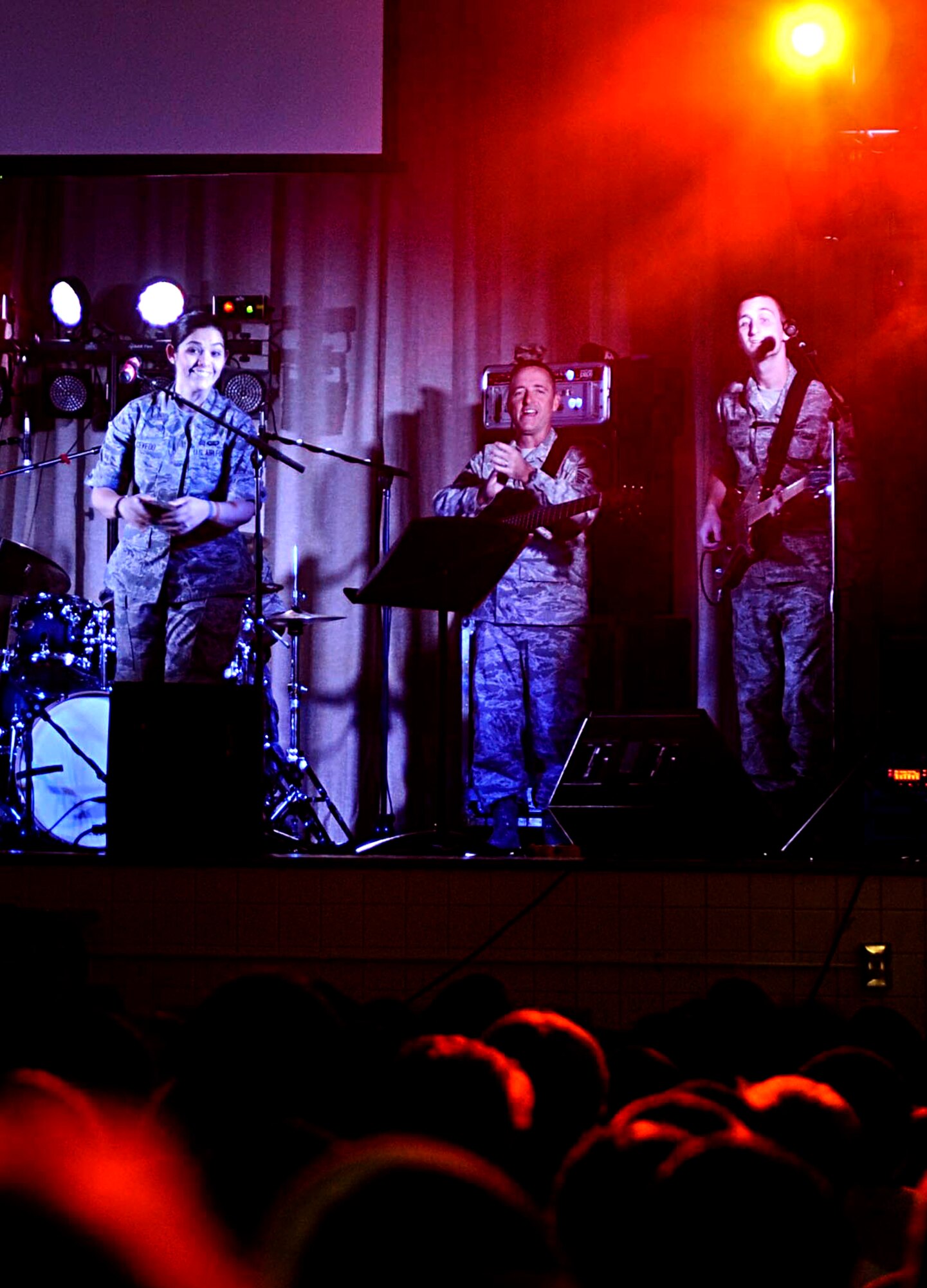 Members of the U.S. Air Force Heritage of America Band’s rock ensemble, “Full Spectrum,” perform at Armstrong Elementary School in Hampton, Va., Oct. 18, 2013. The concert was the culmination of a cultural exchange program the ensemble started with Armstrong students in April designed to take advantage of the band’s partnership-building missions while touring Asia. (U.S. Air Force photo by Airman 1st Class R. Alex Durbin/Released)