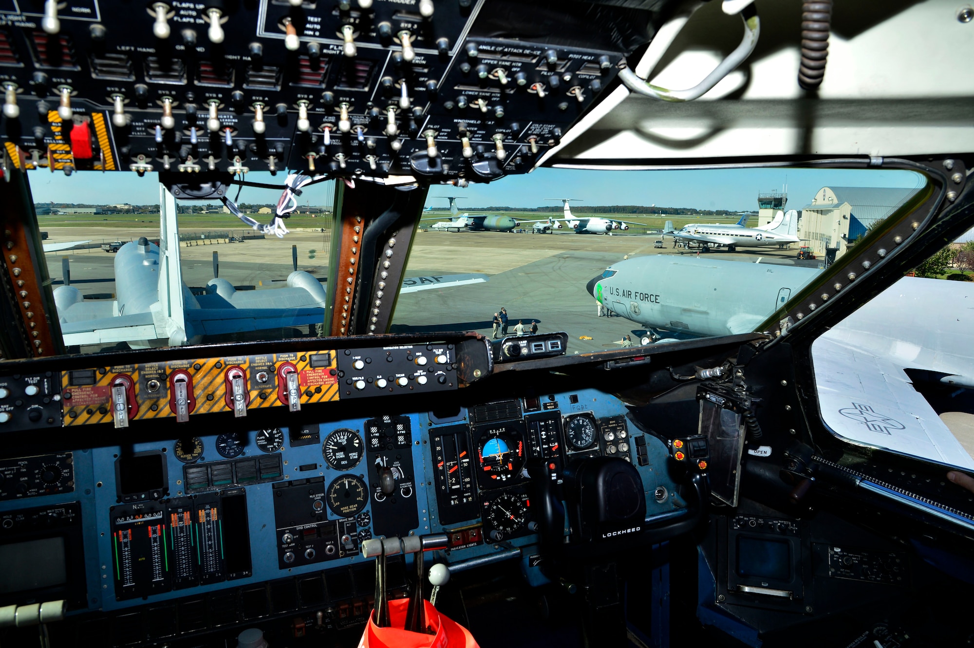 A view from the cockpit of the C-5A Galaxy looking out to the rest of the planes Oct. 21, 2013, at the Air Mobility Command Museum on Dover Air Force Base, Del. The C-5A Galaxy will be unveiled in a ceremony at the Museum on Nov. 9. (U.S. Air Force photo/David Tucker)