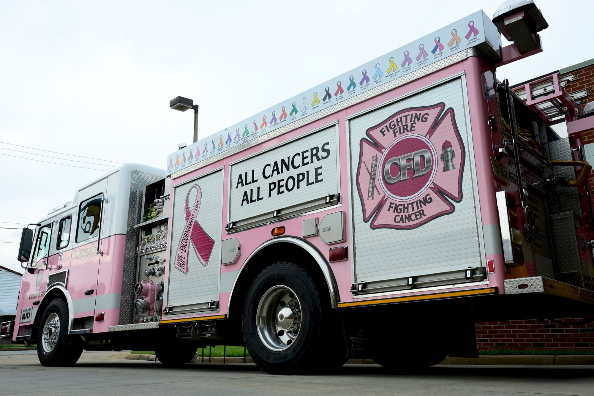 The Chesapeake, Va. Fire Department fire truck, “Pinky,” is displayed at the 733rd Civil Engineer Division fire department at Fort Eustis, Va., Oct. 17, 2013. The vehicle is an active fire truck that CFD personnel drive throughout the Hampton Roads area to raise awareness for all cancers during October, breast cancer awareness month. (U.S. Air Force photo by Staff Sgt. Ashley Hawkins/Released)