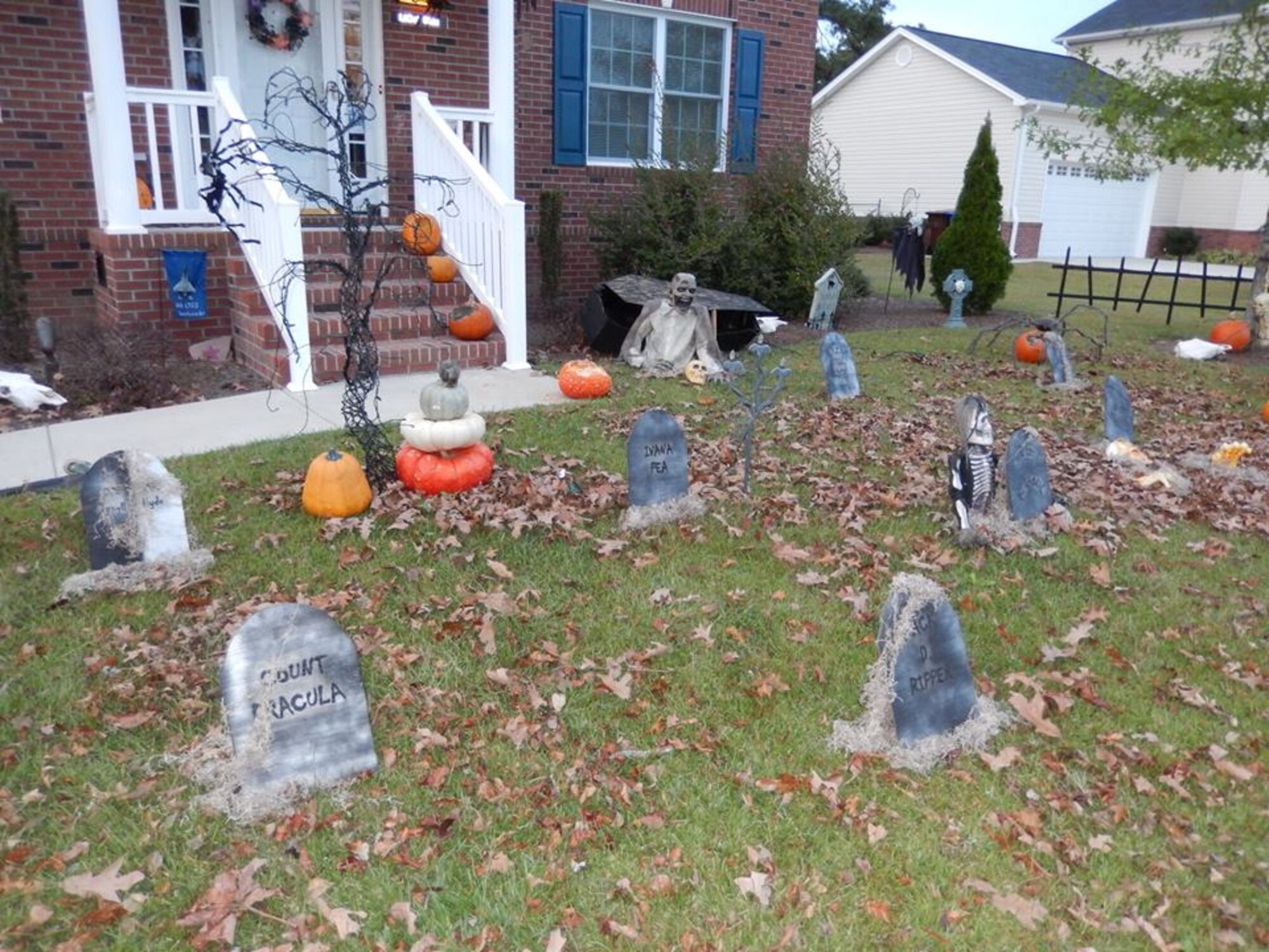 U.S. Air Force Lt. Col. Christine Mau, 4th Operations Support Squadron commander, and her family won the Halloween Decorations Contest for "spookiest" house on Seymour Johnson Air Force Base, N.C. (Courtesy photo)