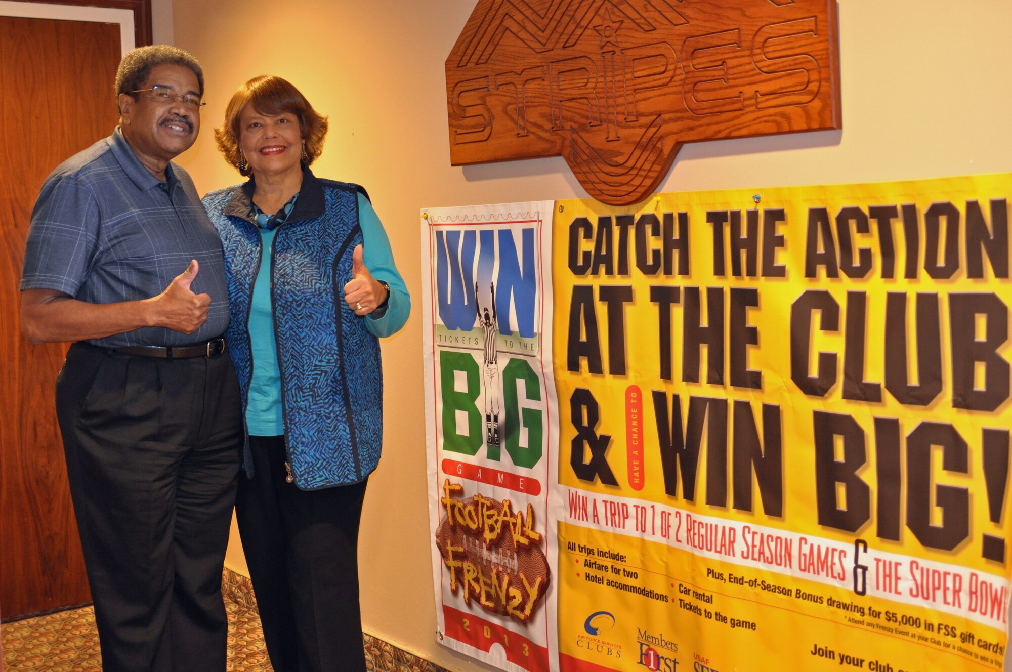 PETERSON AIR FORCE BASE, Colo. – Club member Connie Gault (right) won the first Football Frenzy Club membership prize drawing this season – an all-expense-paid trip to Glendale, Ariz., for the game between the Houston Texans and the Arizona Cardinals on Nov. 10. (U.S. Air Force photo)