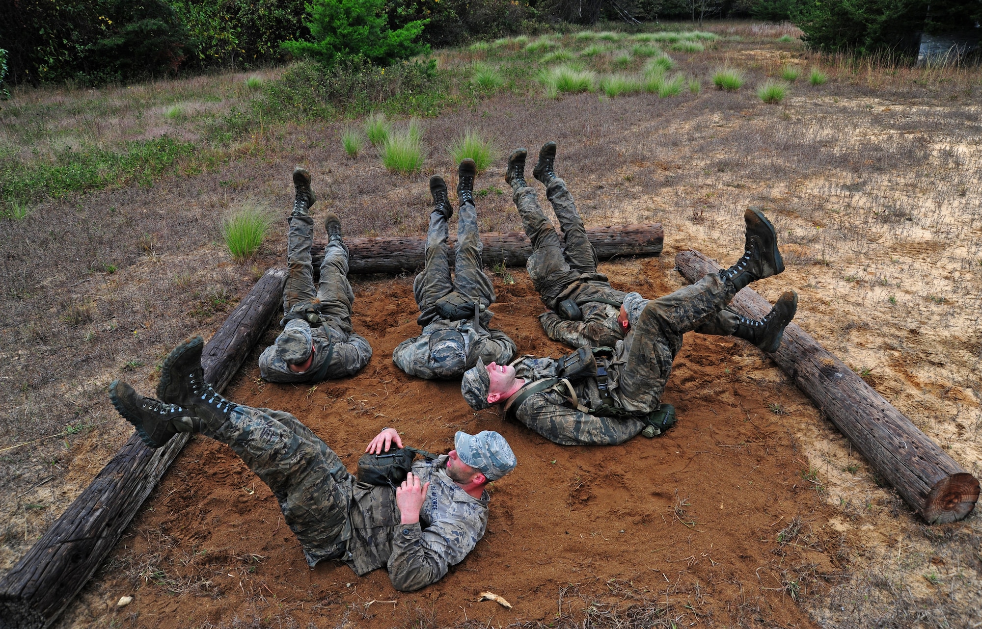 Airmen endure demanding physical exercise during a Pre-Ranger Assessment Course at Davidsonville Communications Site, Md., Oct. 7, 2013. Continual physical exercise and endurance is reinforced daylong throughout the course to ensure the Airmen have the required strength if they were to be selected for the 62 daylong Army Ranger Course. (U.S. Air Force photo/Airman 1st Class Erin O’Shea)