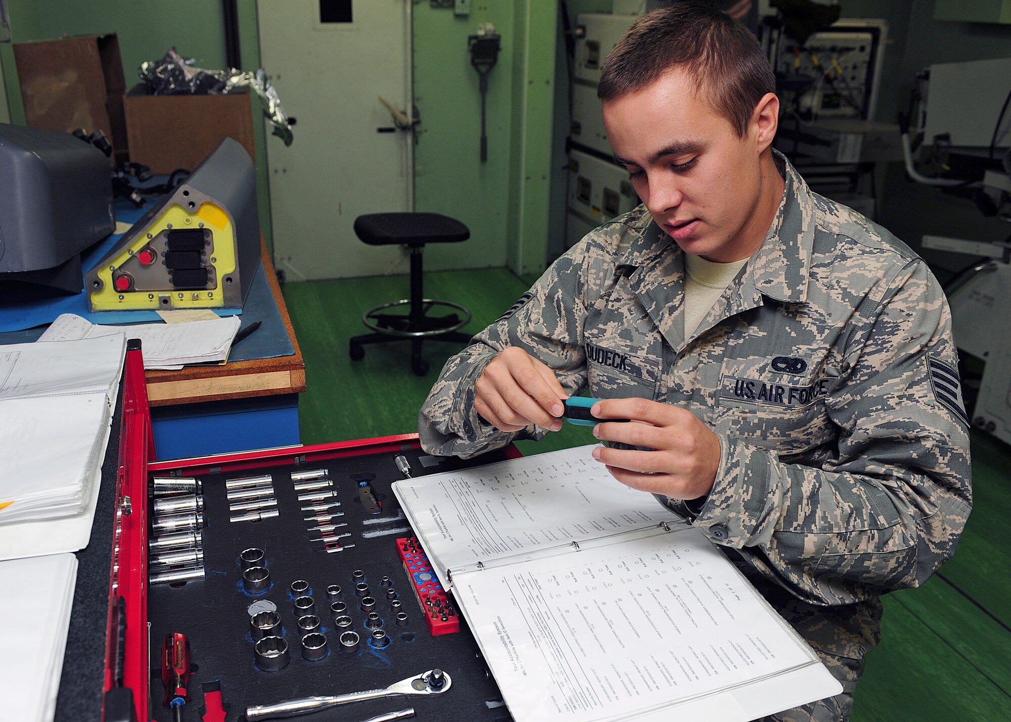 U.S. Air Force Staff Sgt. Nicholas Dudeck, 4th Component Maintenance Squadron avionics flight support member, conducts a composite tool kit inspection at Seymour Johnson Air Force Base, N.C., Oct. 17, 2013. During the inspection, Dudeck checked the tools for accountability and serviceability. (U.S. Air Force photo by Airman 1st Class John Nieves Camacho)