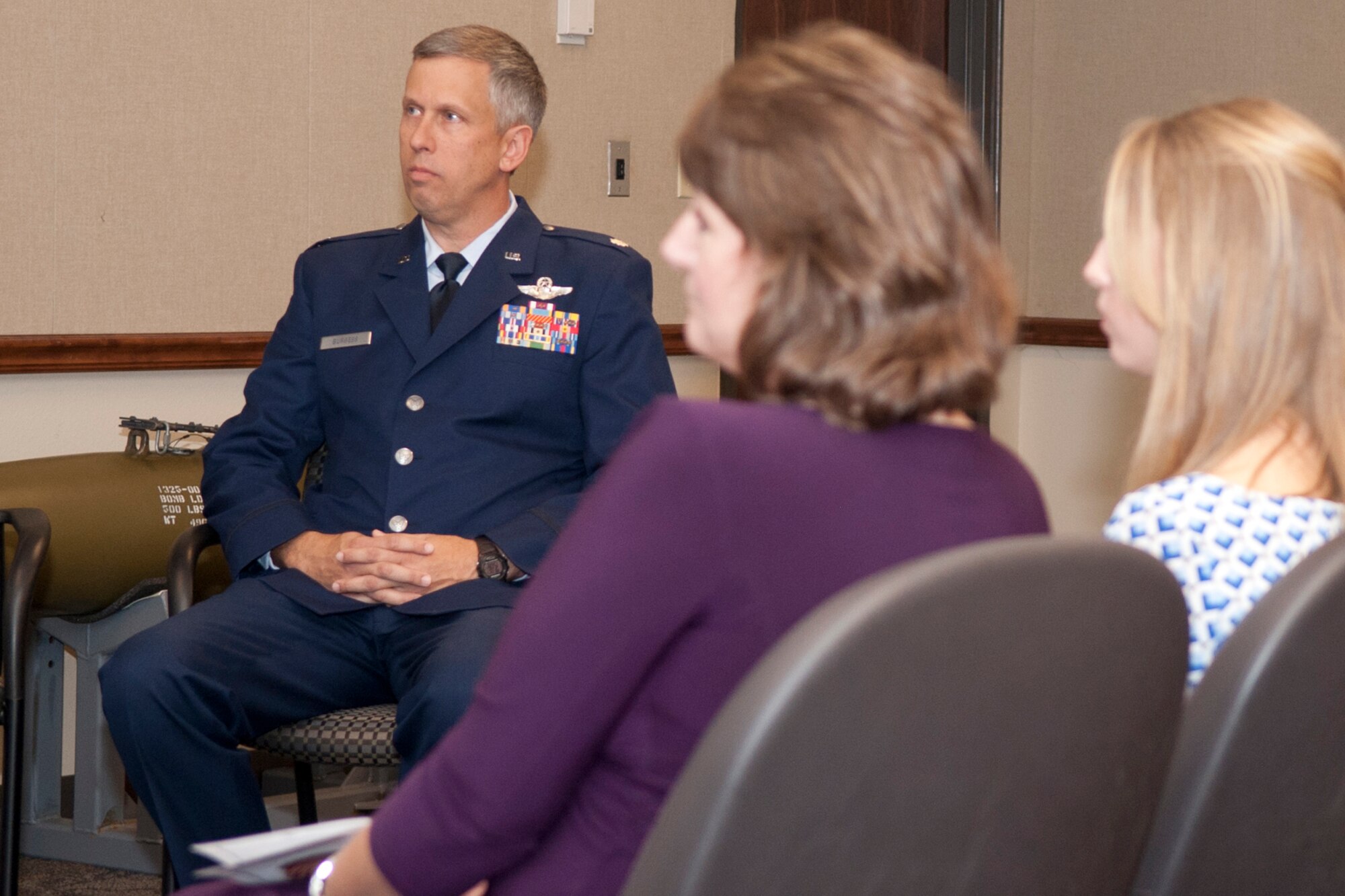 Lt. Col.  Robert N. Burgess listens as Colonel Keith Schultz, commander, 307th Operations Group, makes a few comments during the change of command ceremony for the 343rd Bomb Squadron at Barksdale Air Force Base, La., Oct. 21, 2013. Taking the reins of the 343 BS, Burgess became the third commander for the unit, which was officially reactivated on April 1, 2010, at Barksdale. (U.S. Air Force photo by Master Sgt. Jeff Walston)
