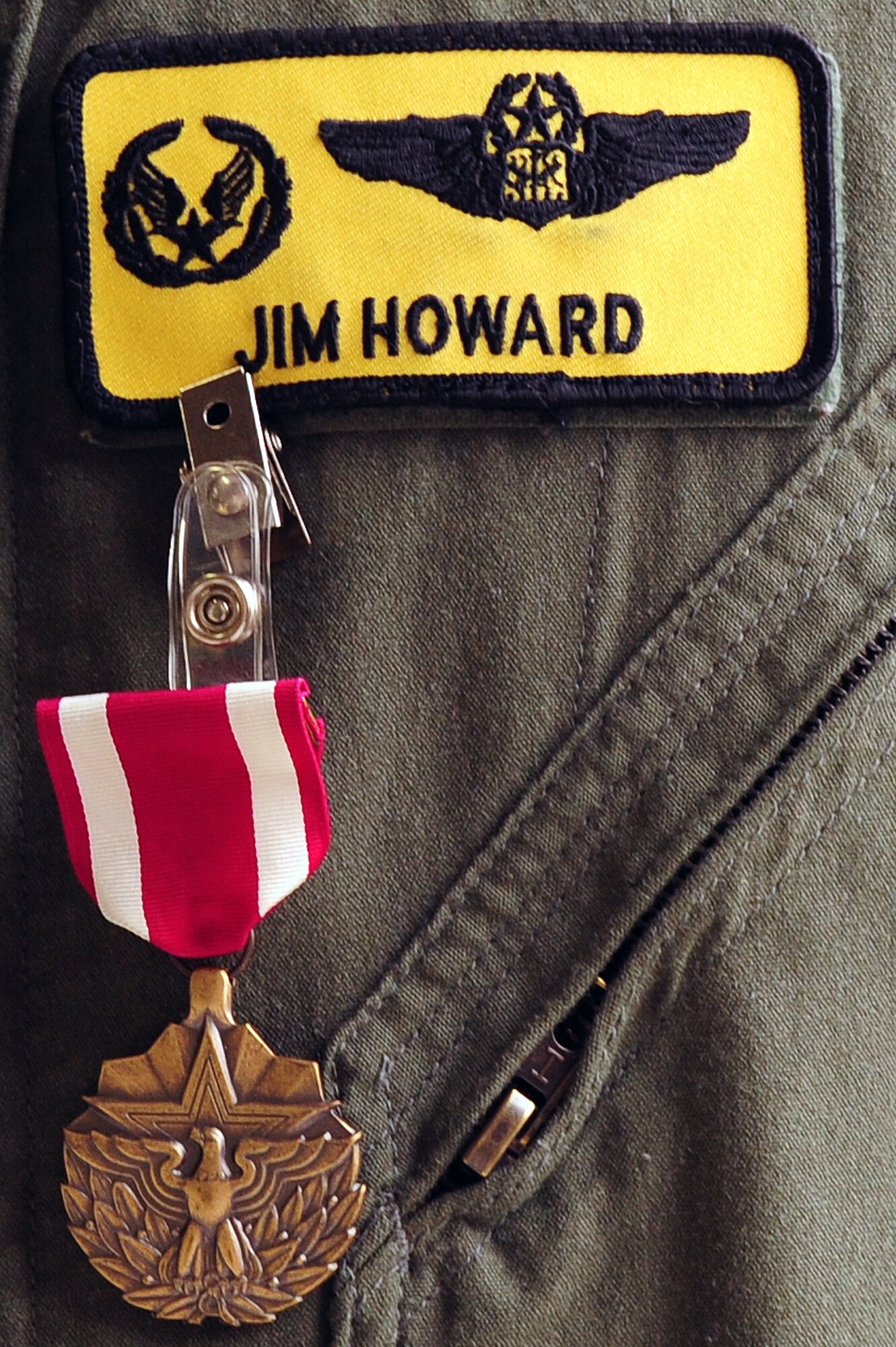 U.S. Air Force Lt. Col. James Howard, 336th Fighter Squadron outgoing commander, receives a Meritorious Service Medal during a change of command ceremony at Seymour Johnson Air Force Base, N.C., Oct. 18, 2013.  Howard is now the deputy commander of the 4th Operations Group.  (U.S. Air Force photo by Airman 1st Class Brittain Crolley)