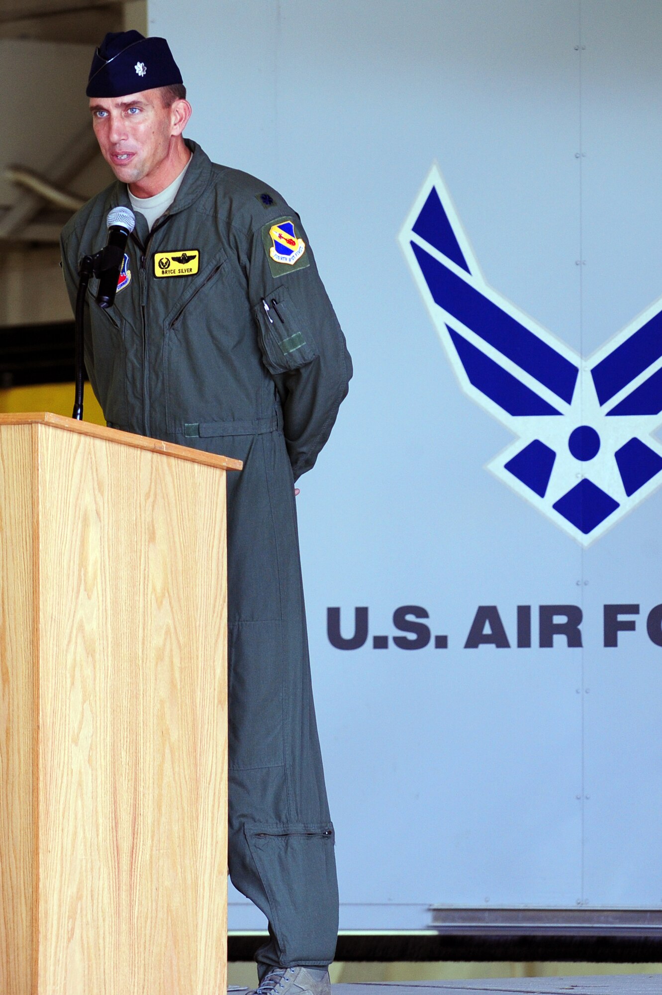 U.S. Air Force Lt. Col. Bryce Silver, 336th Fighter Squadron incoming commander, gives a speech during a change of command ceremony at Seymour Johnson Air Force Base, N.C., Oct. 18, 2013.  Before being selected to take over the Rocketeers, Silver previously held the position of director of operations at the 333rd FS.  (U.S. Air Force photo by Airman 1st Class Brittain Crolley)