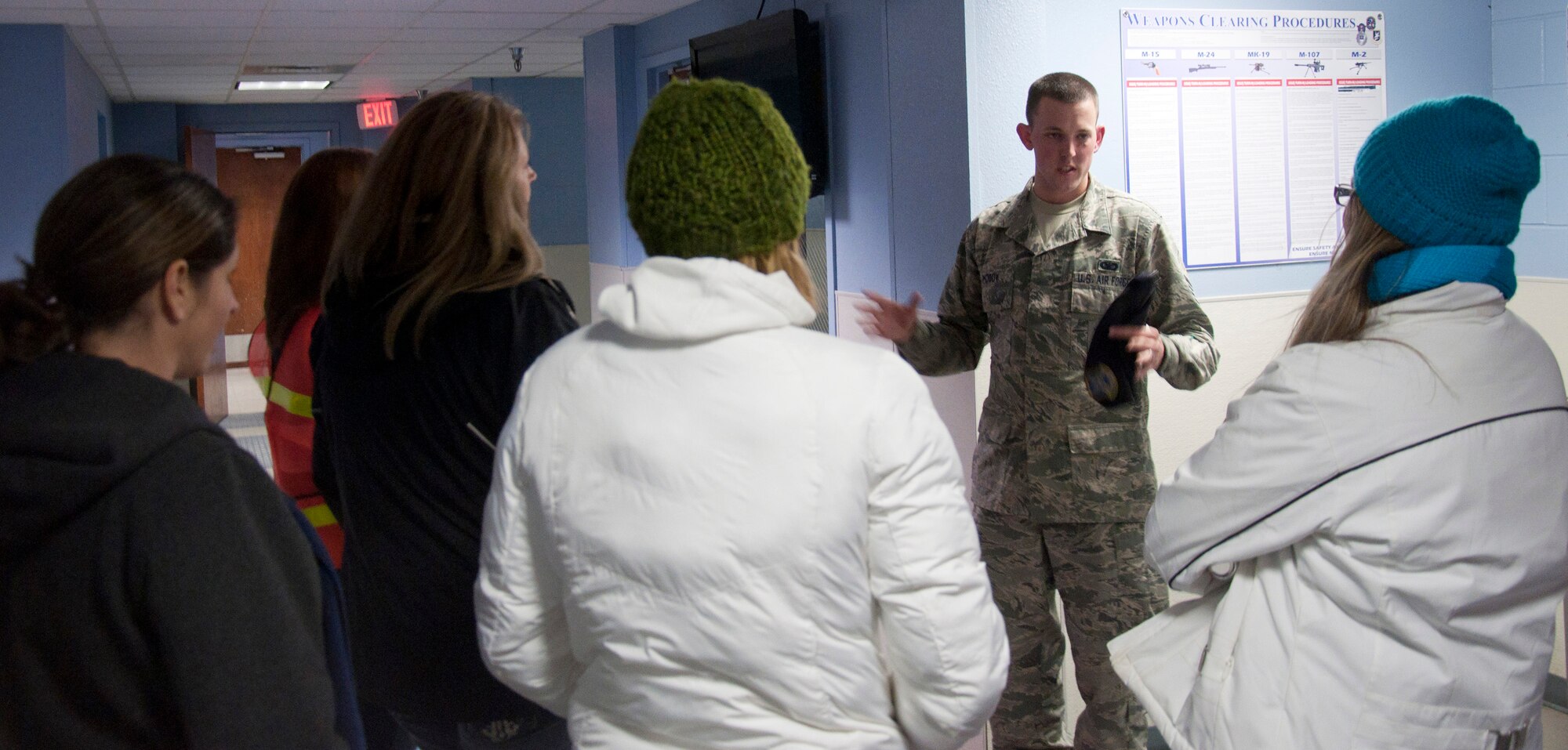 131015-F-GZ967-010 Staff Sgt. Kevin Moody, 90th Security Forces Support Squadron, tells a mysterious ghost tale during a tour of the security forces building as part of the haunted scavenger hunt Oct. 15, 2013, of his experiences inside the armory of the building. The 90th Security Forces Group created a mini-tour for the participants, including a visit to a few of the “suspected” haunted rooms in the building – the third floor storage room, the basement boiler room and a ride on the haunted elevator.  (U.S. Air Force photo by Airman 1st Class Brandon Valle)
