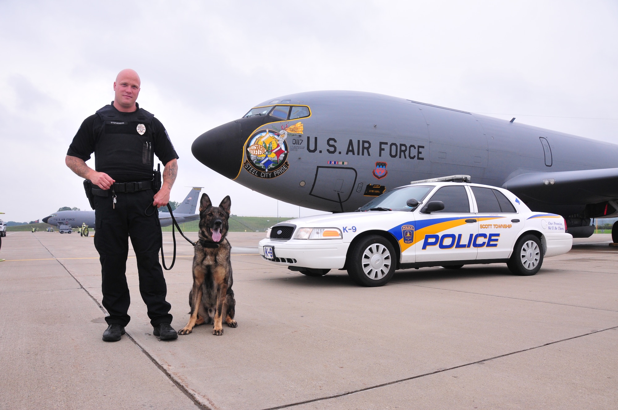 The 171st Air Refueling Wing, located near Pittsburgh, Pennsylvania, provides a secure location for local law enforcement agencies to train their K-9 units, August 28, 2013. Beaver County, Center Township, Findlay Township and Scott Township Police Departments attended. K-9 units must continuously train on building, vehicle, area, and evidence searches to fulfill training requirements. Training also includes apprehension, narcotic detection, tracking scenarios, and handler protection.  Having a secure, controlled location is important for efficient training and for the safety of the dogs. In addition to fulfilling training requirements, this combined effort also allows the 171st and local law enforcement agencies the ability to share ideas and training techniques in order to better serve the community and the commonwealth (U.S. Air National Guard Photo by Tech. Sgt. Shawn Monk/Released)