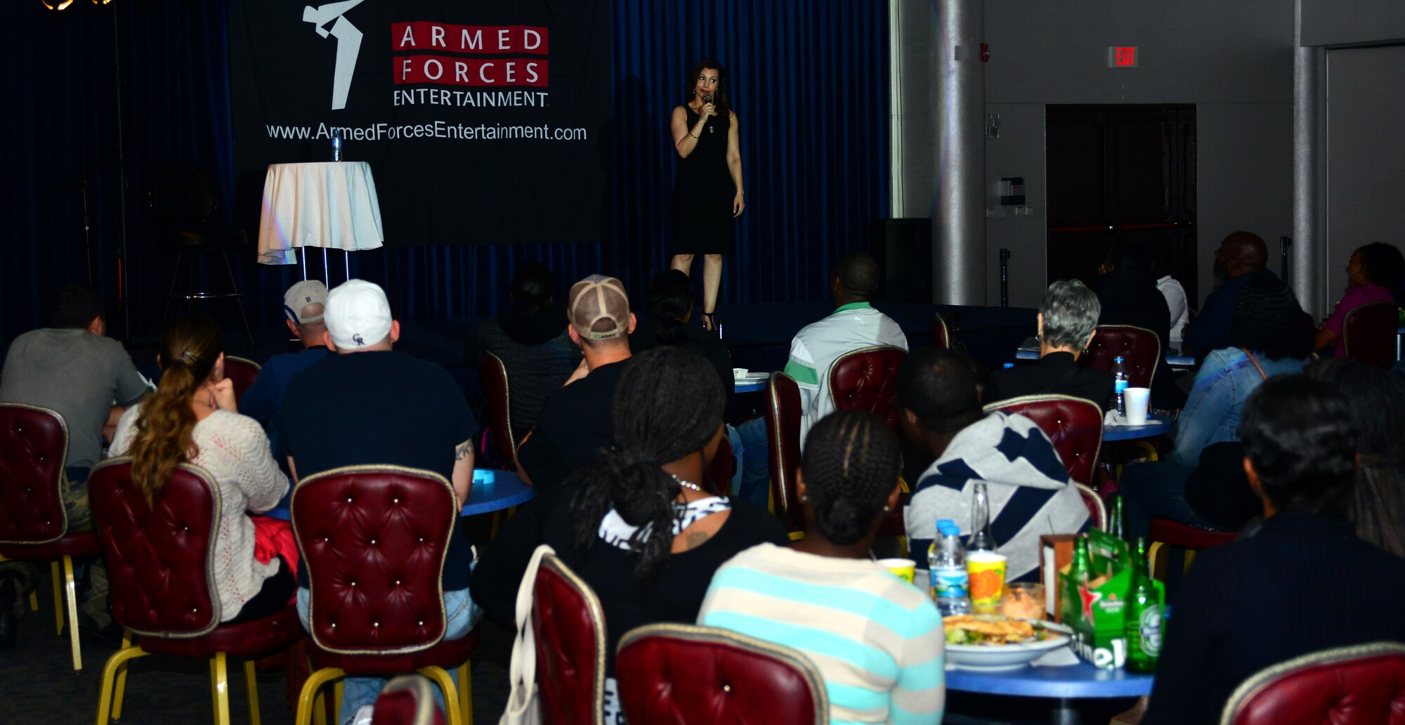 Shayma Tash, comedian, performs as part of the “Funny Ladies and Vargus” tour Oct. 21, 2013, at Incirlik Air Base, Turkey. The tour visited several locations in Eastern Europe to visit service members. (U.S. Air Force photo by Staff Sgt. Eric Summers Jr./Released)