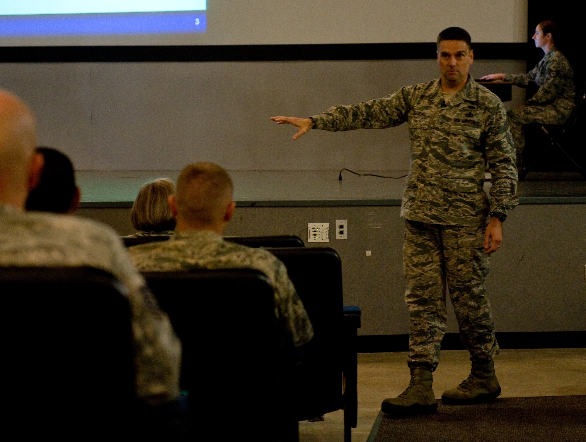 Chief Master Sgt. Scott Delveau, 7th Air Force command chief, explains the United States Forces Korea structure to Kunsan Airmen during an all-call at Kunsan Air Base, Republic of Korea, Oct. 24, 2013. Delveau is touring the peninsula speaking to Airmen about the role they play in the defense of the Korean peninsula. (U.S. Air Force photo by Senior Airman Armando A. Schwier-Morales/Released)